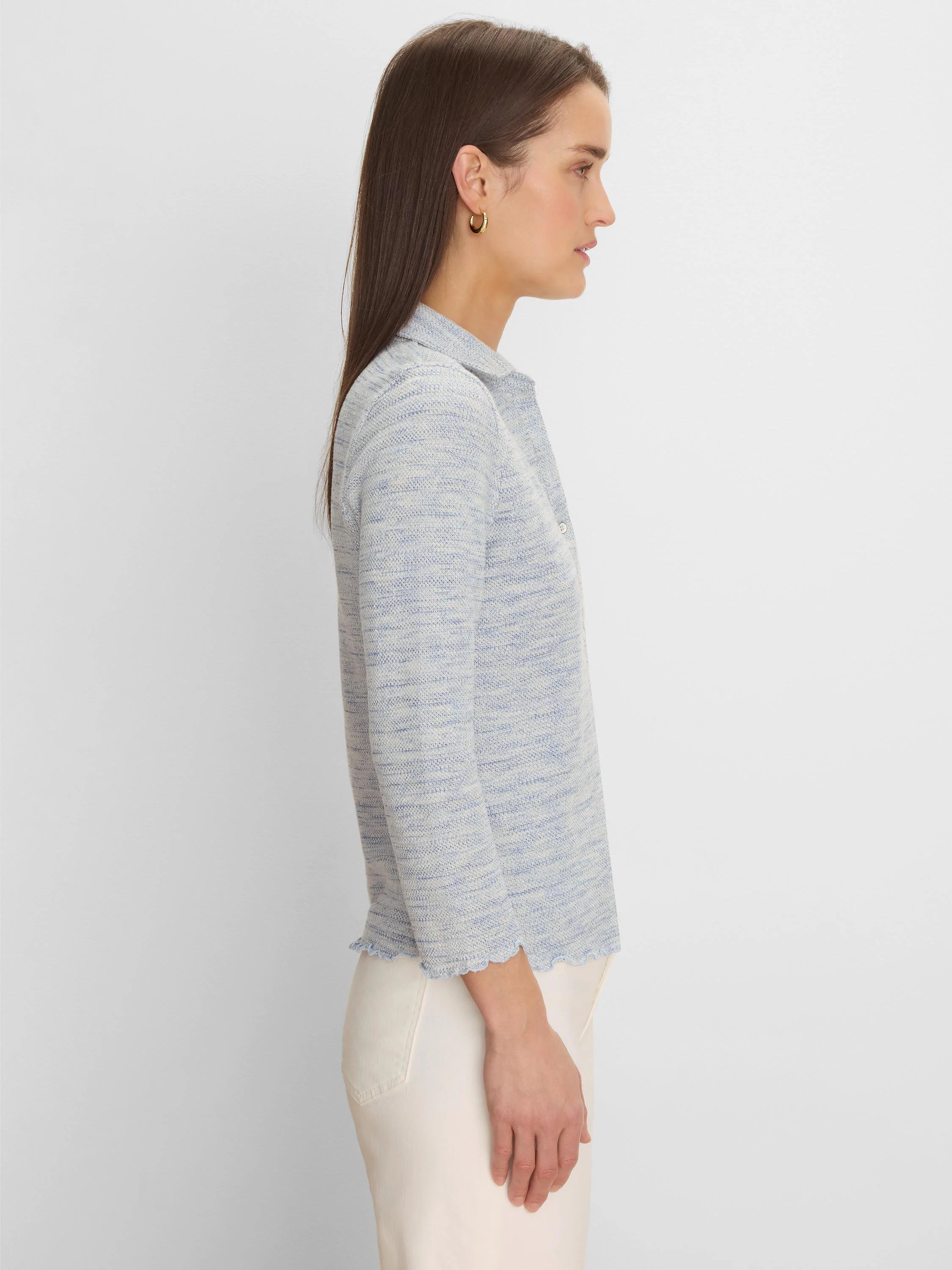 Light blue and white spacedye knit polo with elbow sleeves and scalloped cuffs and hem.