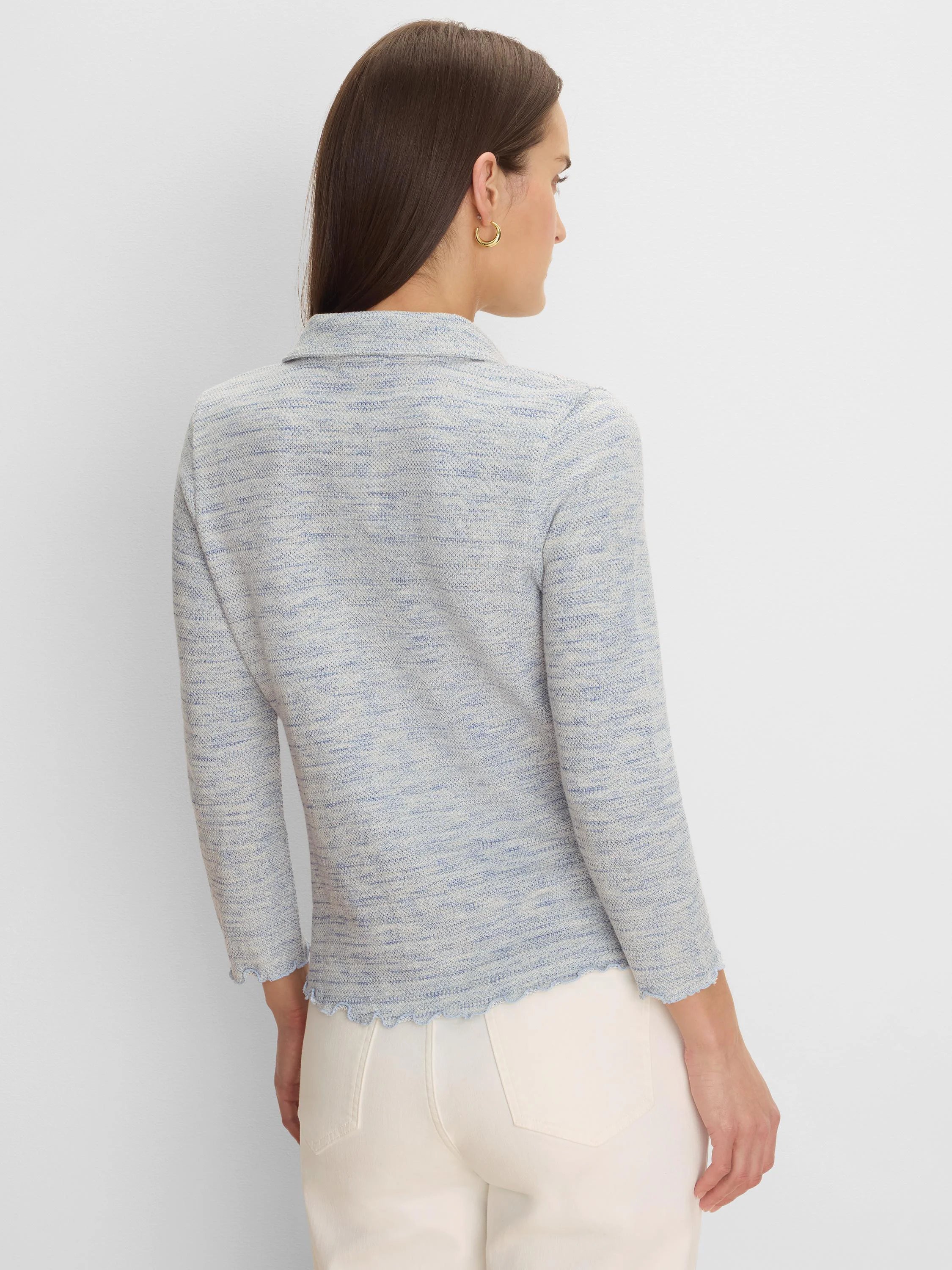 Light blue and white spacedye knit top with a collar, elbow-length sleeves, and a scalloped hem.