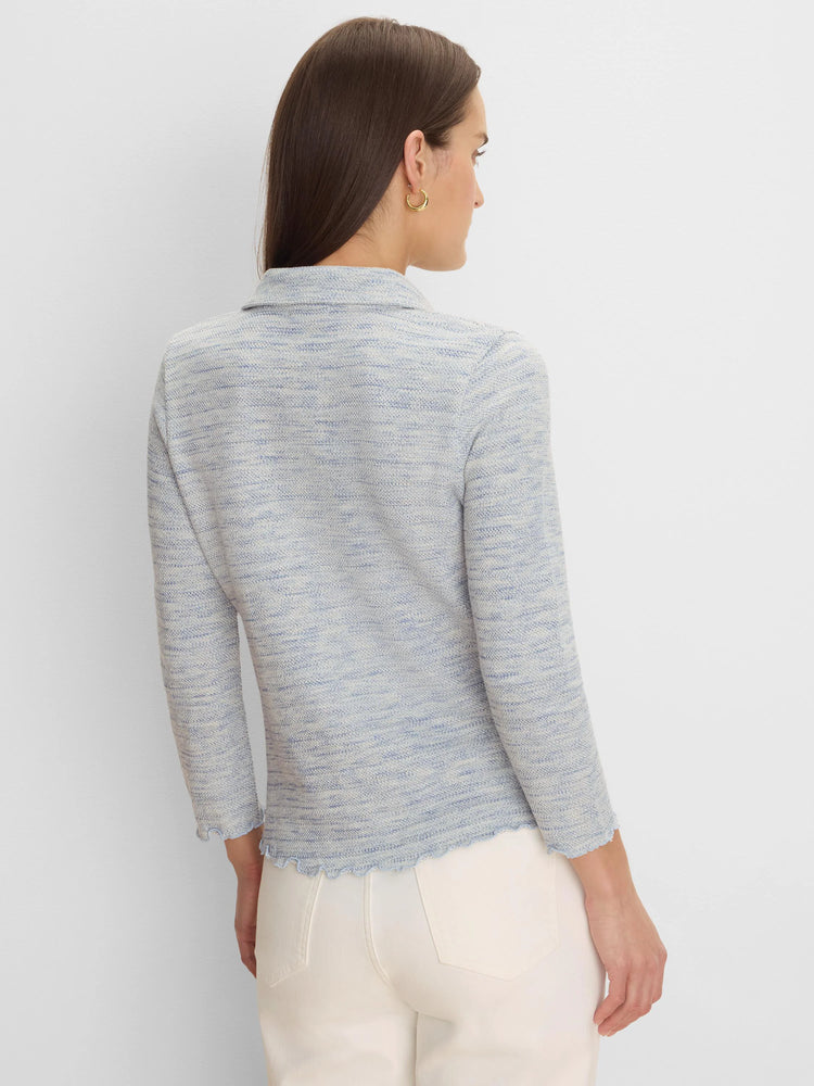 Light blue and white spacedye knit top with a collar, elbow-length sleeves, and a scalloped hem.
