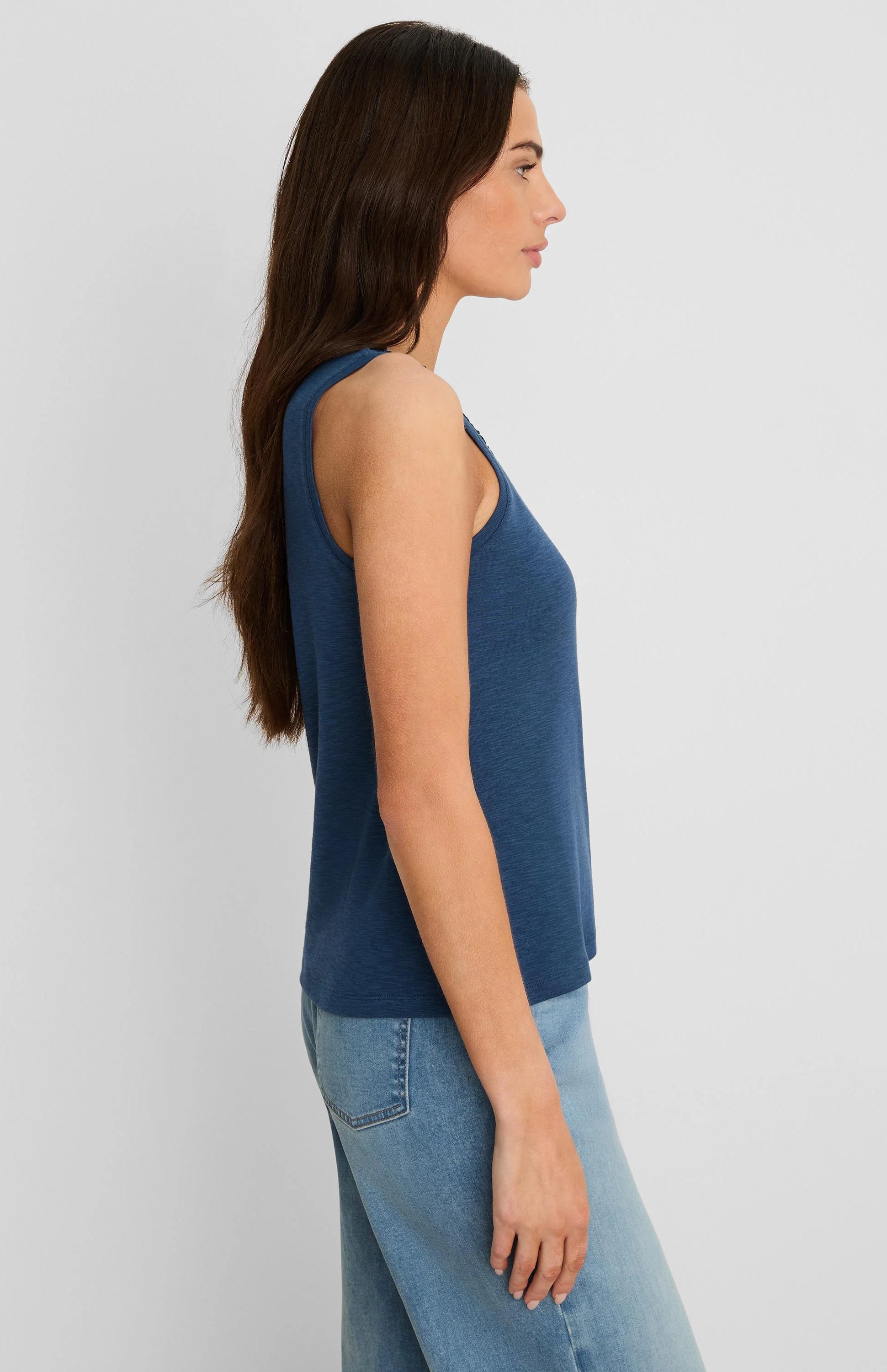 Deep blue slub knit tank top with a subtle ruffle neckline.
