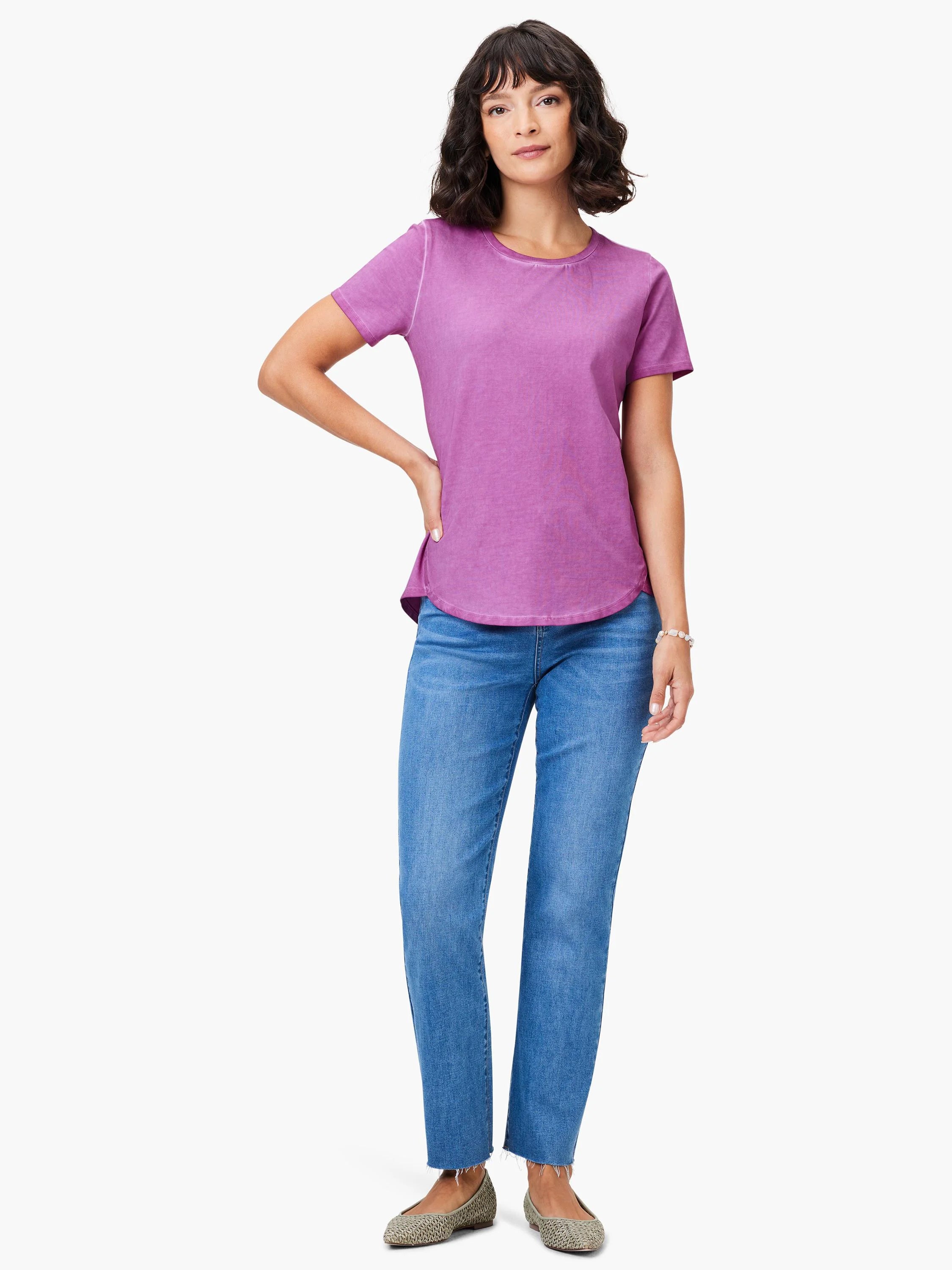 Washed purple short-sleeve crew neck tee with a visible curved hem.