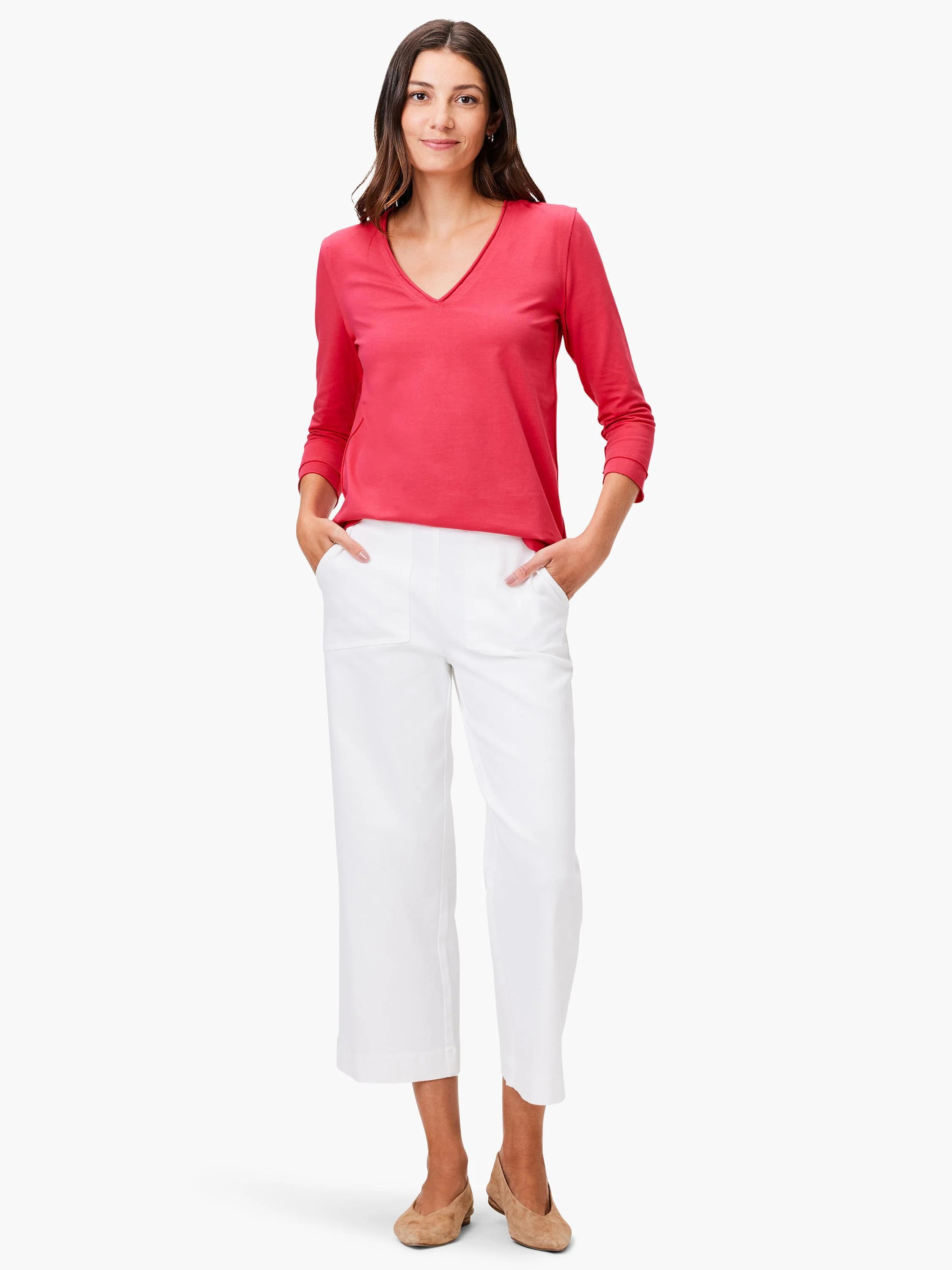 Coral pink 3/4 sleeve V-neck tee with rolled cuffs.