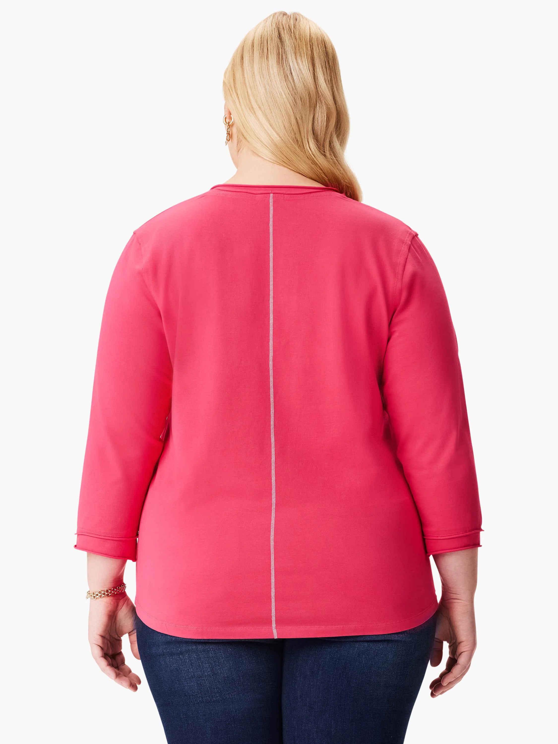 Bright pink 3/4 sleeve tee with white vertical stitch on back and rolled cuffs.