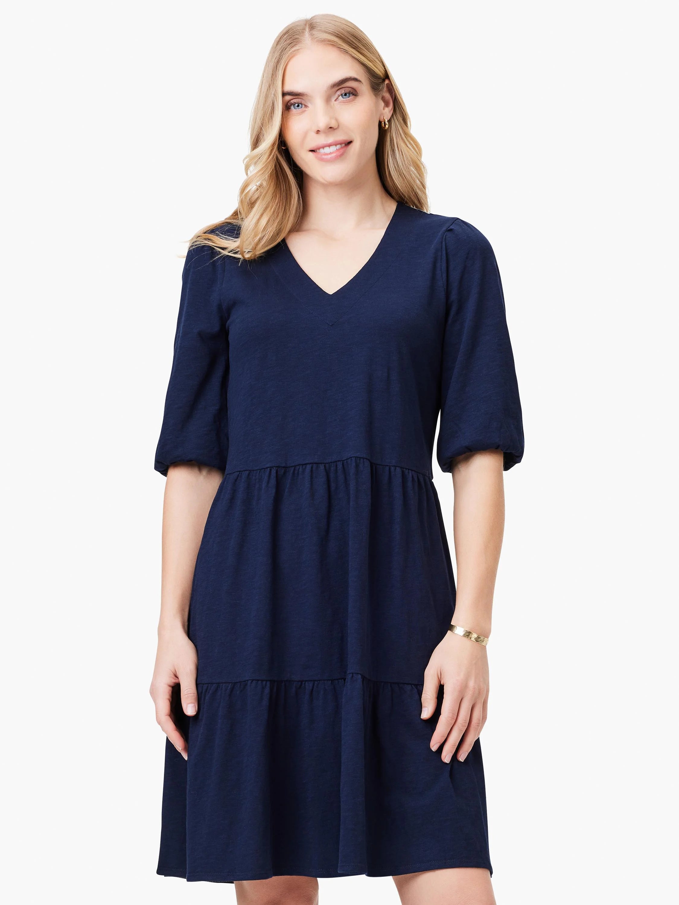 Navy blue tiered V-neck dress with short, puffed sleeves.