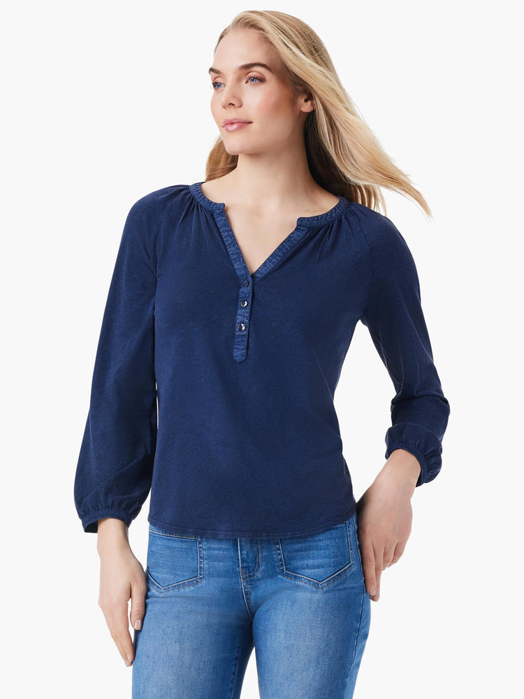 Navy blue, 3/4 sleeve top with split neck and three button placket. Slight puff sleeves.