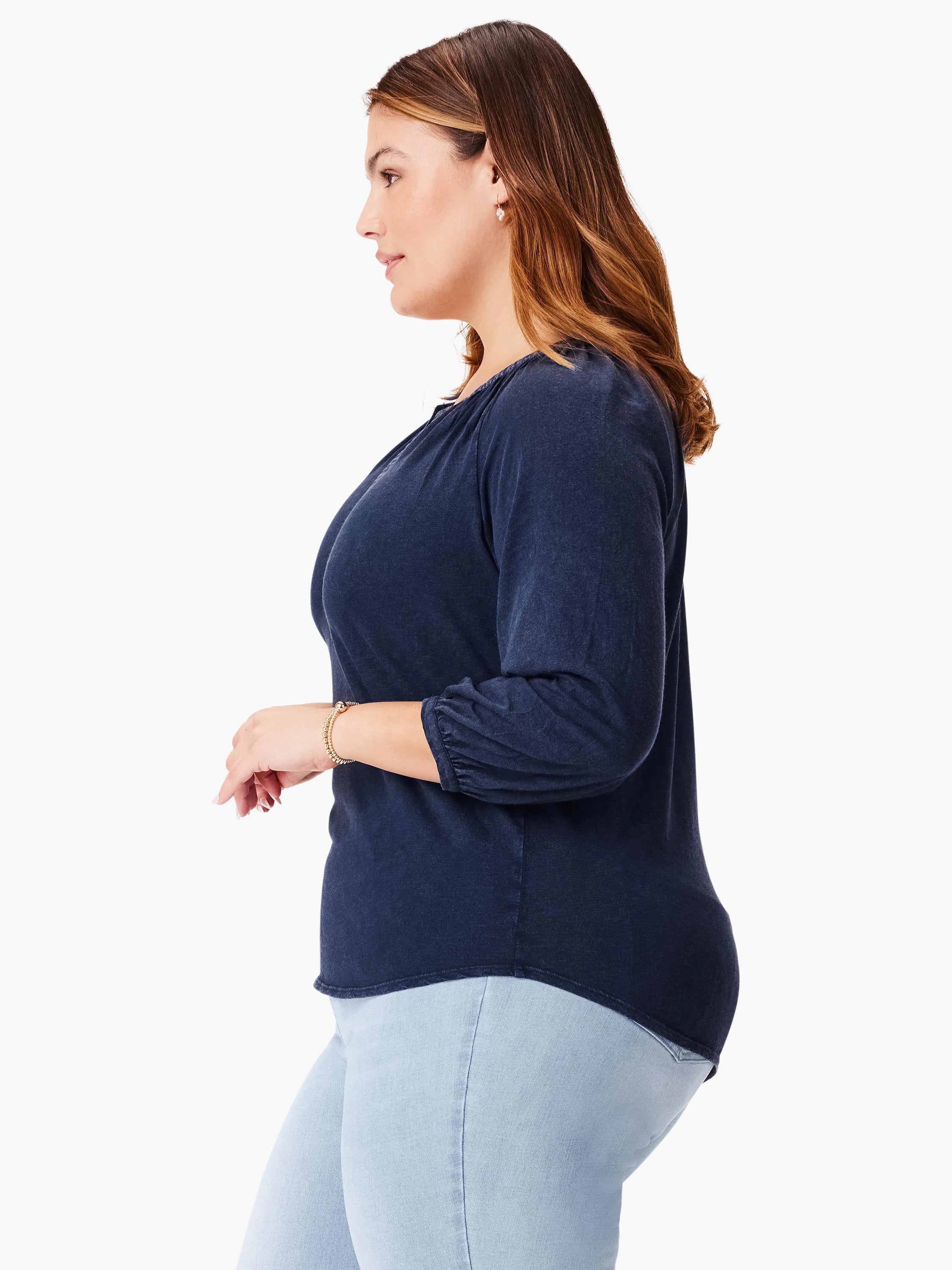 Dark navy blue, 3/4 sleeve top with split neckline.  Model shown wearing light blue jeans.