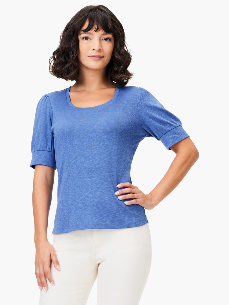 Blue scoop-neck tee with short, slightly puffed sleeves. Textured fabric.