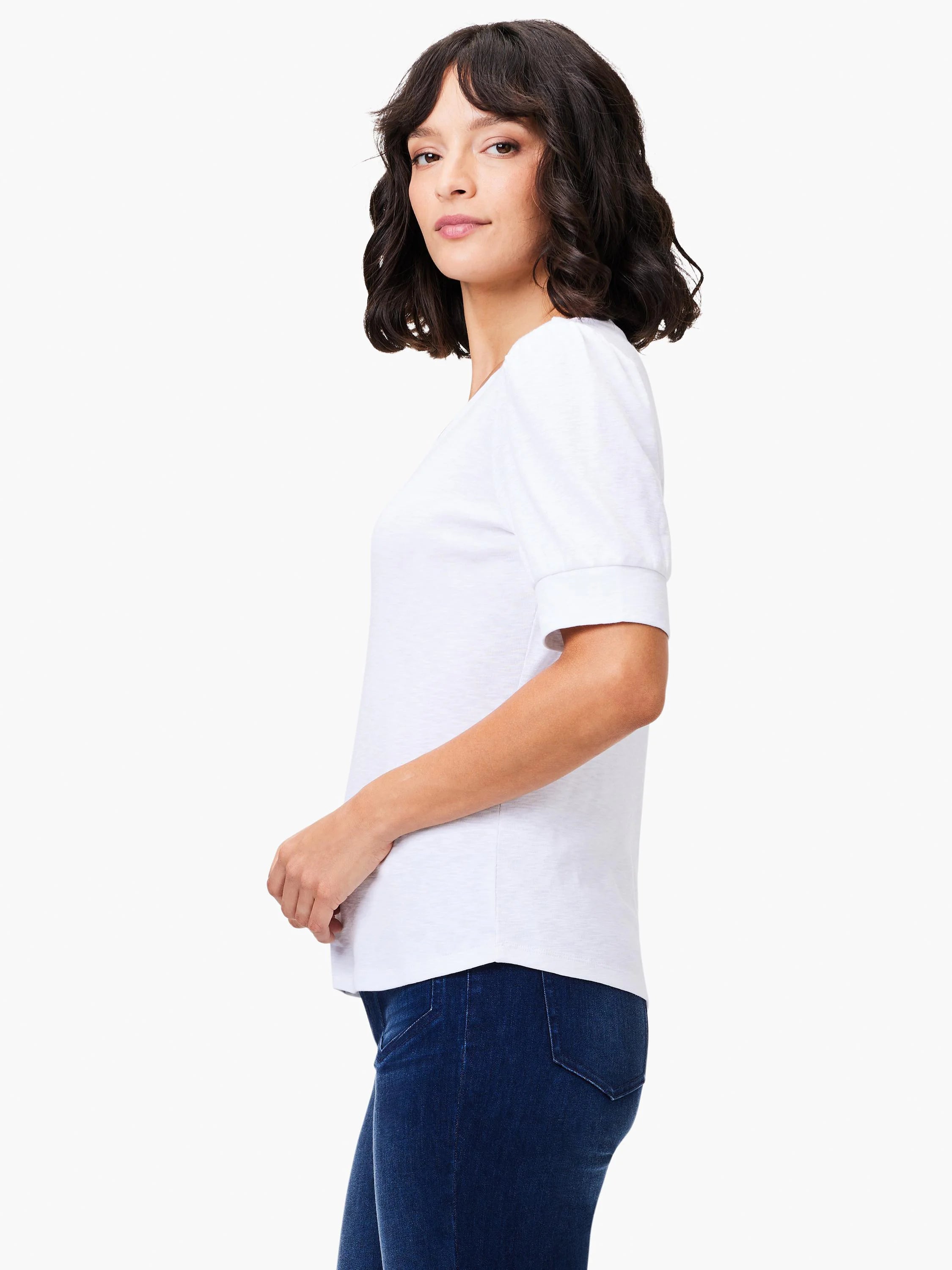 White scoop-neck tee with short, slightly puffed sleeves. Side profile shows relaxed fit.