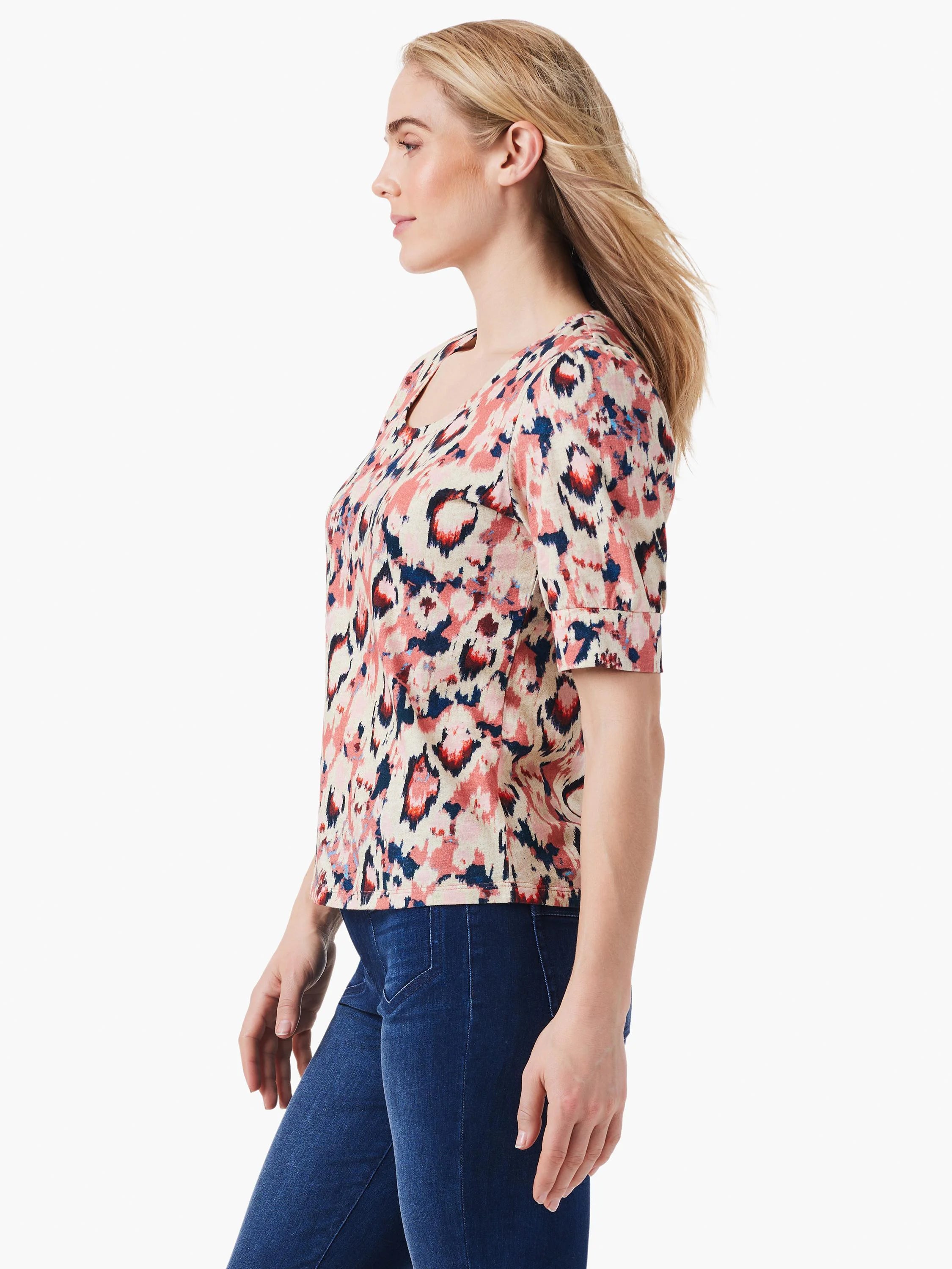 Scoop-neck, elbow-length sleeve shirt. Pink, cream, and dark blue ikat pattern.