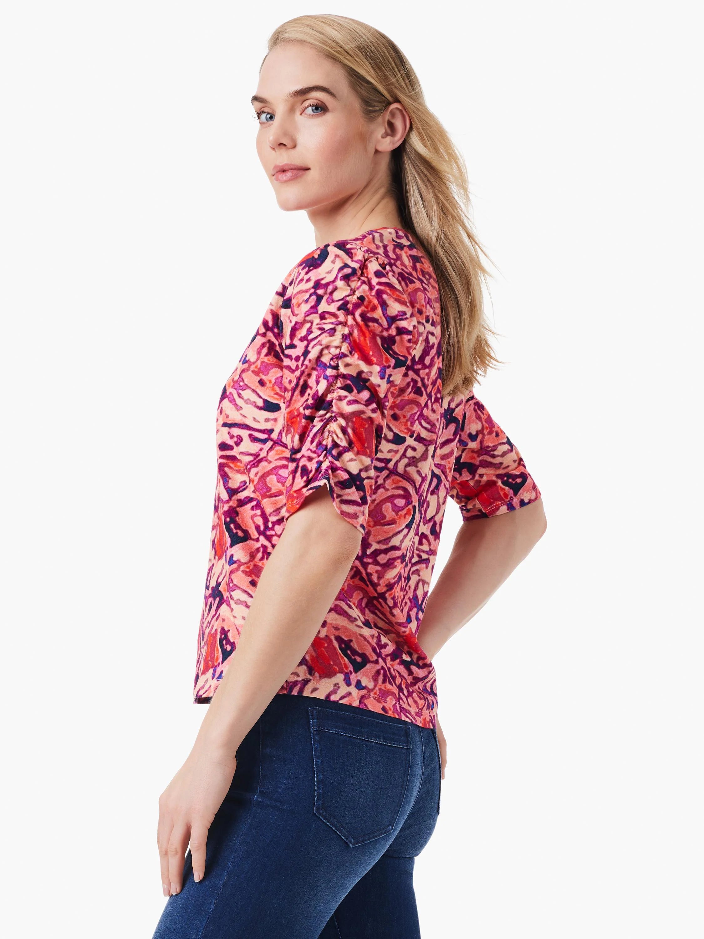 Pink, red, and purple abstract print top. Ruched elbow-length sleeves, split hem.