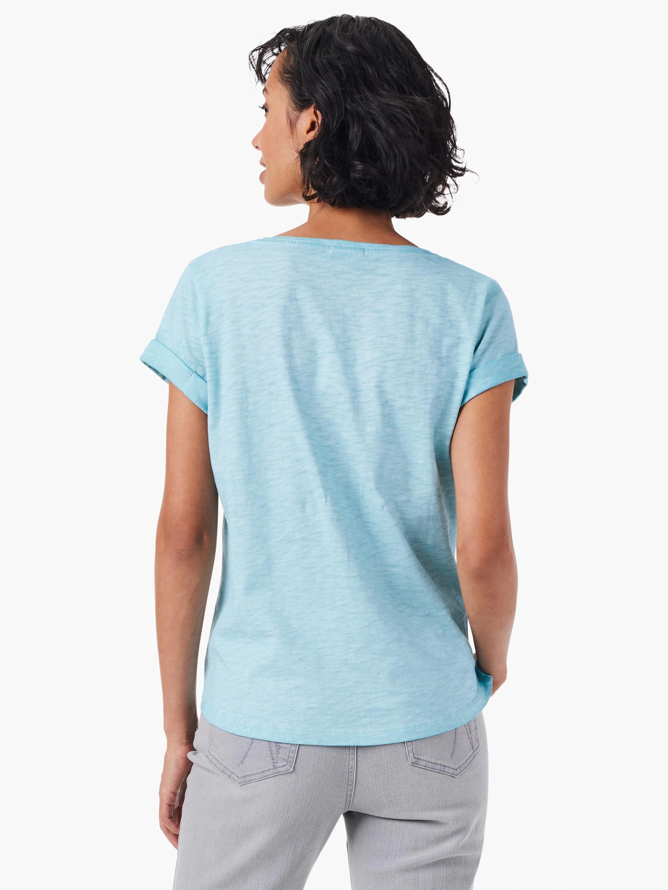 Back view of light blue, short-sleeved split neck tee. Rolled cuffs.