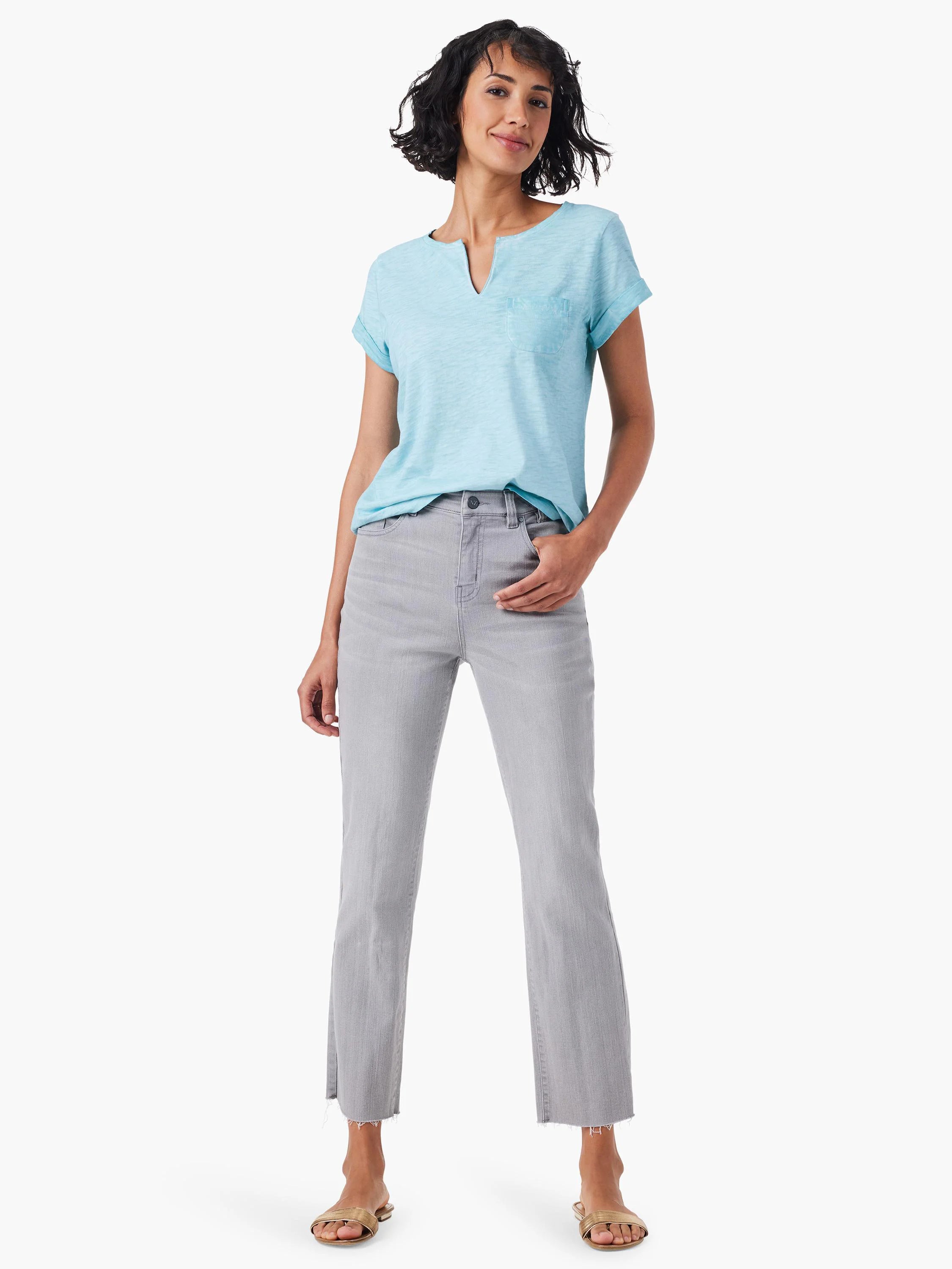 Light blue split-neck tee with a small pocket, shown with grey cropped jeans.