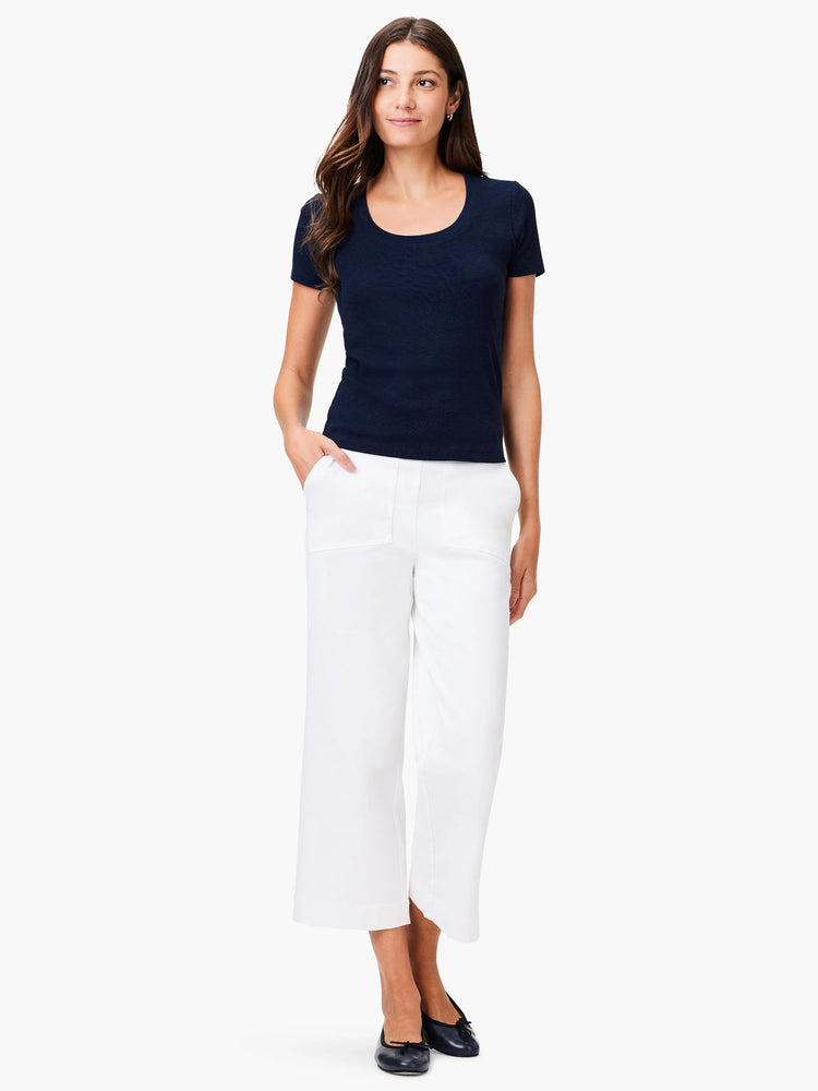 Navy blue scoop-neck short-sleeve shirt.