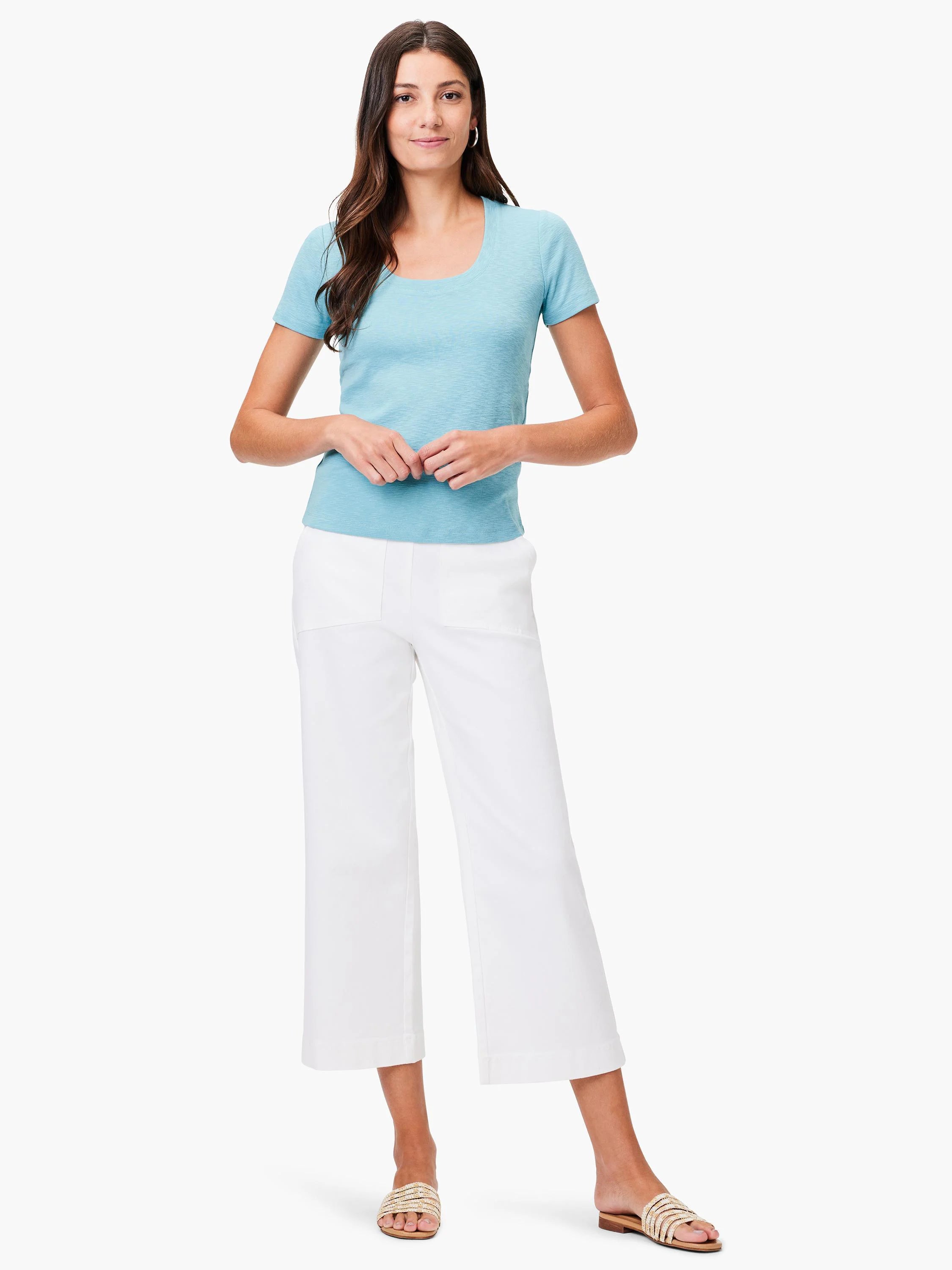 Light blue scoop-neck short-sleeve tee. Shown on a model.