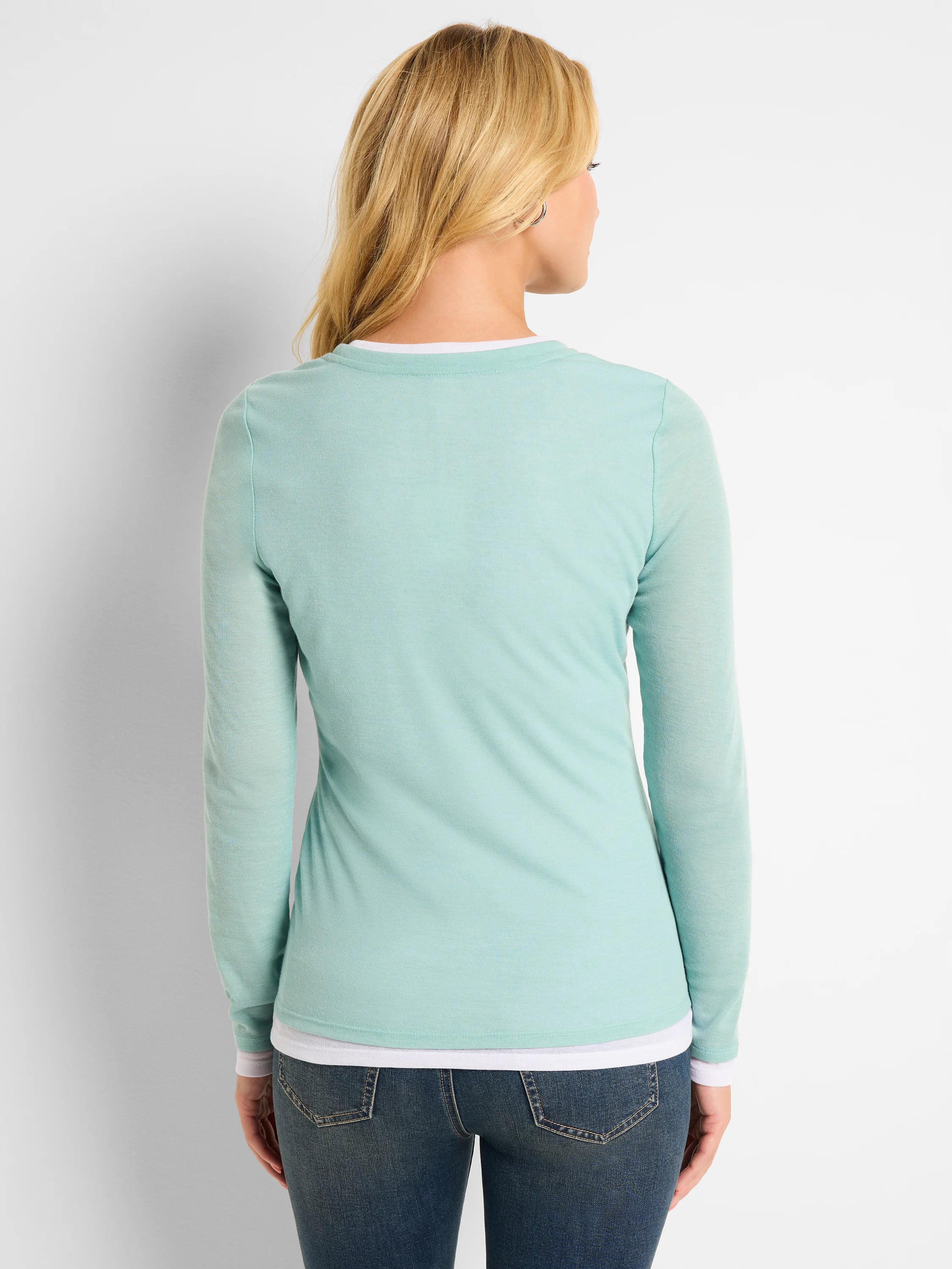 Here's alt text for the image, under 125 characters:
"Pale teal long-sleeve shirt, double-layered with white undershirt....