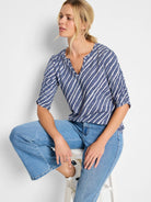 Navy blue and white striped 3/4 sleeve shirt; ruched sleeves; V-neck.