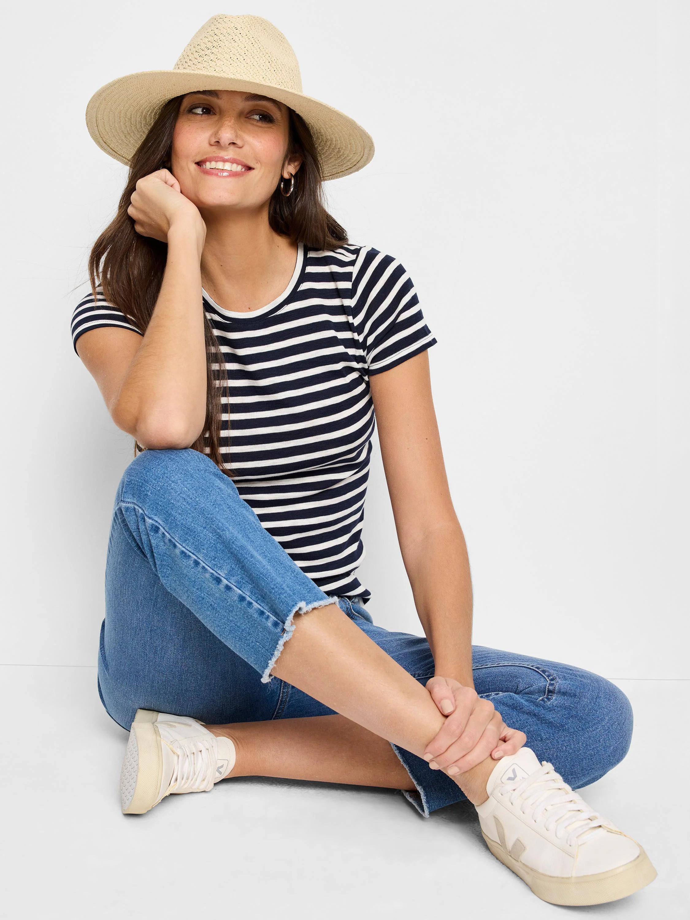 Navy blue and white striped short-sleeve crew neck tee.
