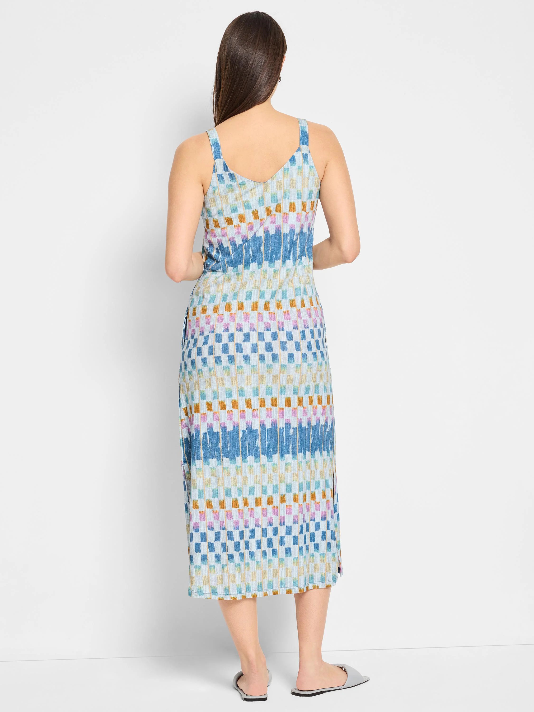 Blue, beige, pink, and orange checkered pattern V-neck midi tank dress.  Back view.