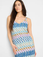 V-neck tank dress with a light blue, teal, and orange ikat pattern.  The dress is sleeveless and midi-length.