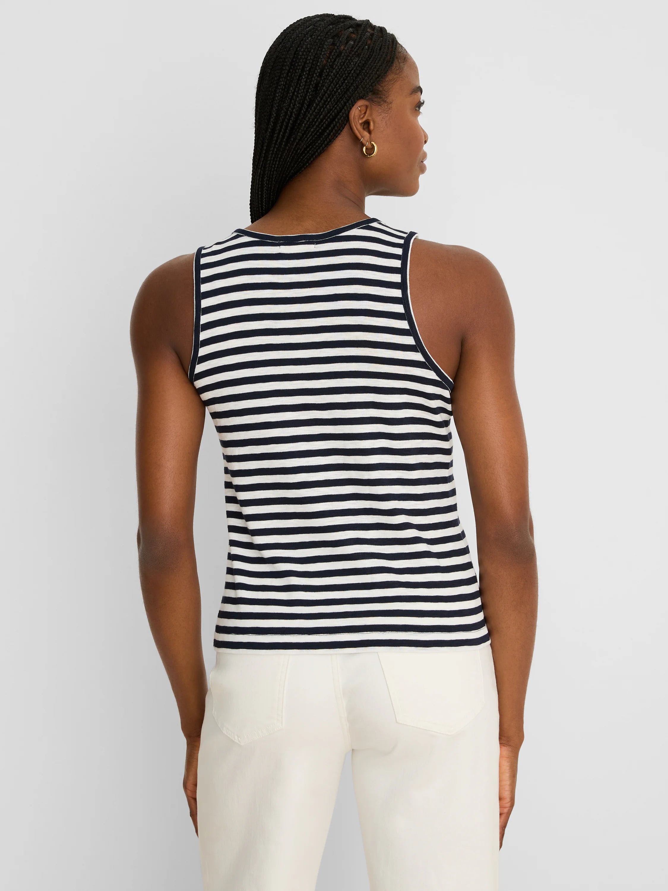 Navy and cream horizontally striped ribbed tank top, seen from the back on a model.