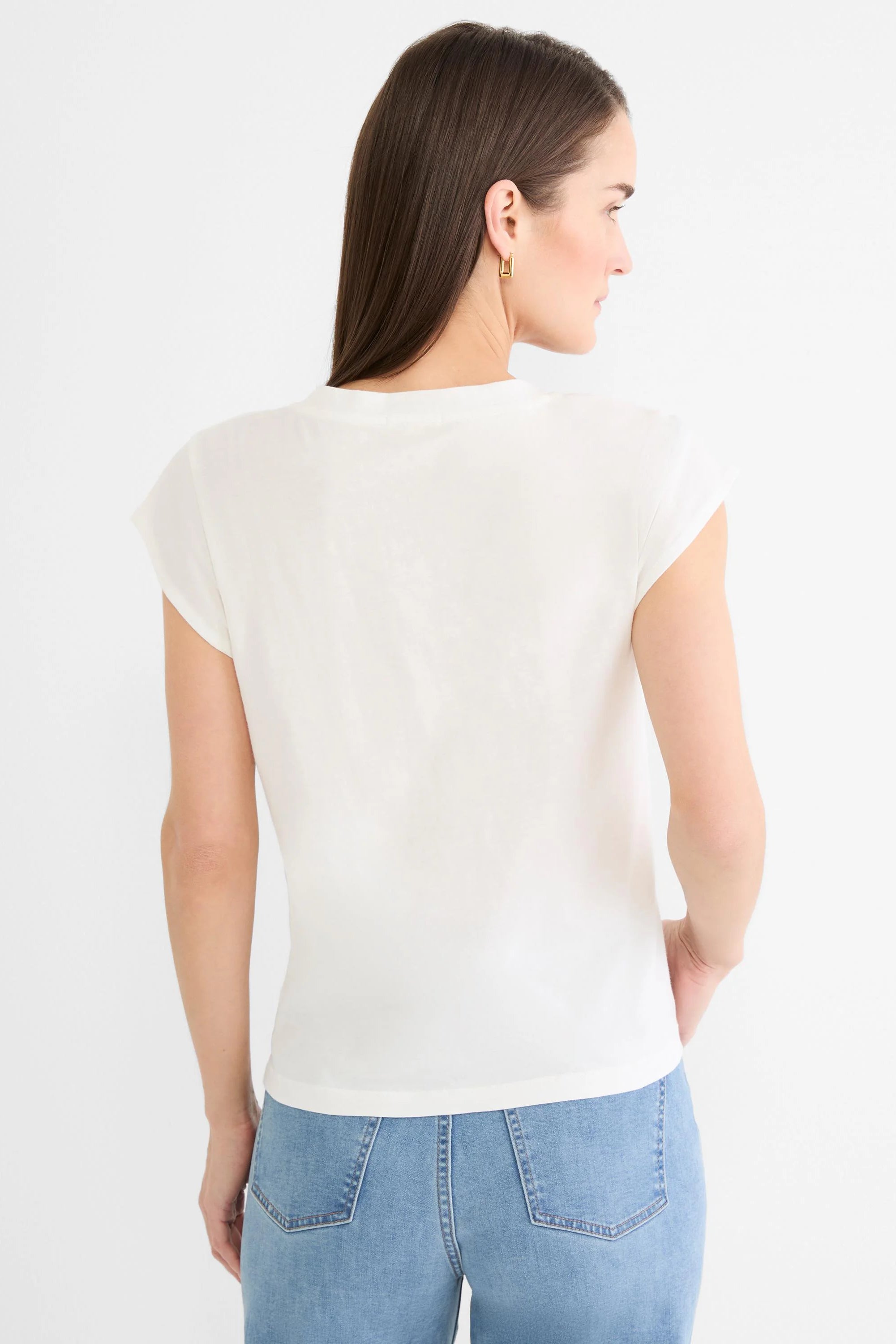 Back view of an off-white cap sleeve tee. Features a simple rounded back neckline and soft fabric.