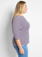 Light pink and navy horizontal stripe 3/4 sleeve boat neck tee.