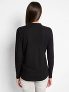 Black long-sleeve henley shirt, shown from the back.  The shirt has a fitted silhouette.