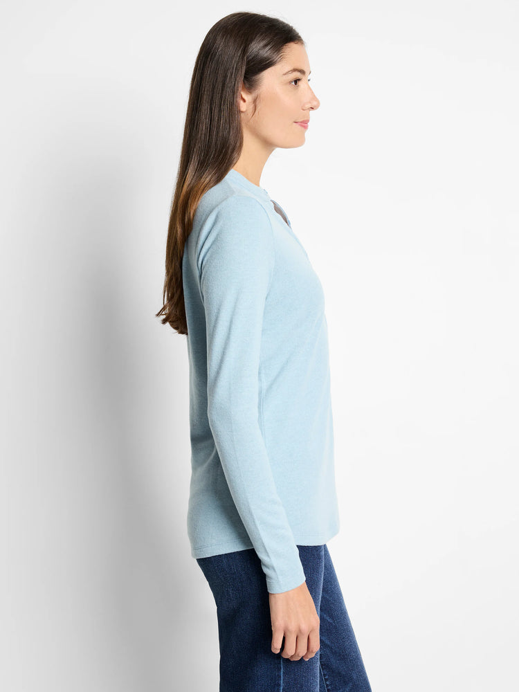 Light blue long-sleeve henley shirt; side profile view. Henley placket detail.