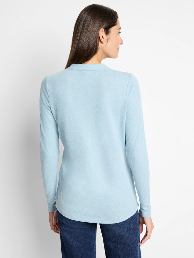 Back view of light blue long-sleeved henley shirt. Solid color, no visible patterns.