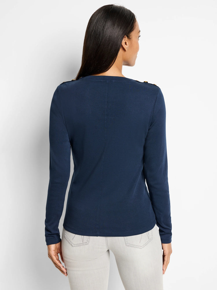 Navy blue long-sleeve top, button details on shoulders. Back view.
