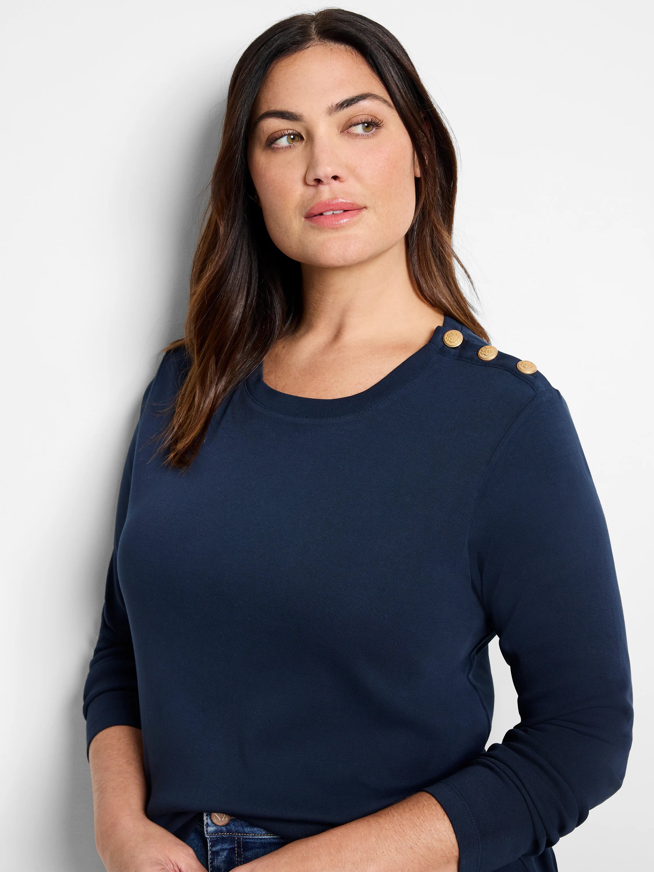 Navy blue long-sleeve top with gold buttons on the shoulder.  Crew neck.