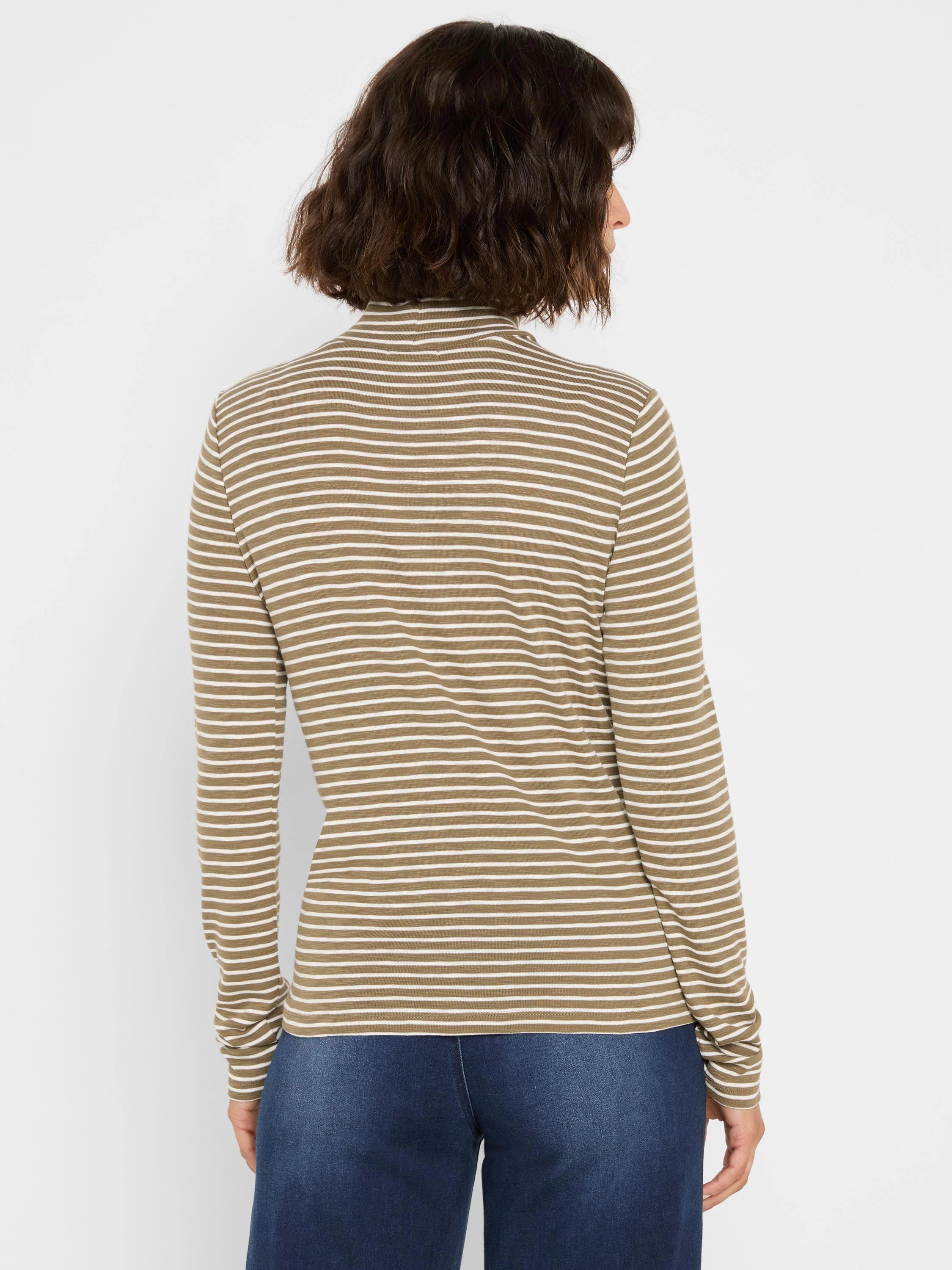Olive green and white striped long sleeve mock neck tee, seen from behind.