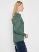 Heathered dark green long-sleeve jersey tee on woman, side profile, with a visible double-layer neckline.