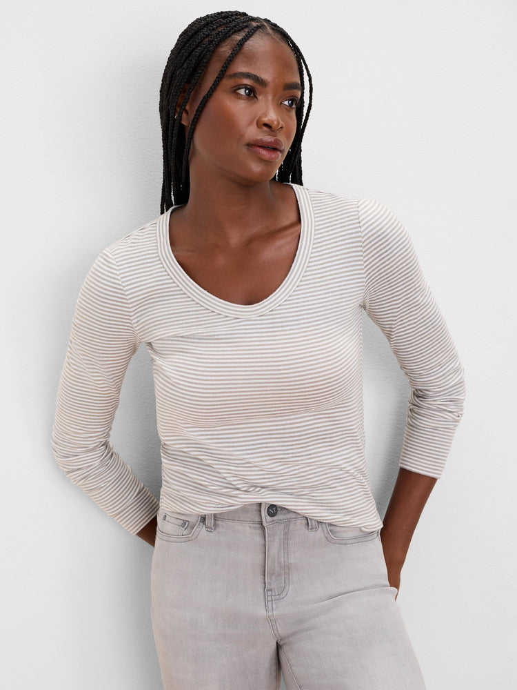 Off-white and light taupe striped long sleeve tee with a V-neck. Brushed fabric.