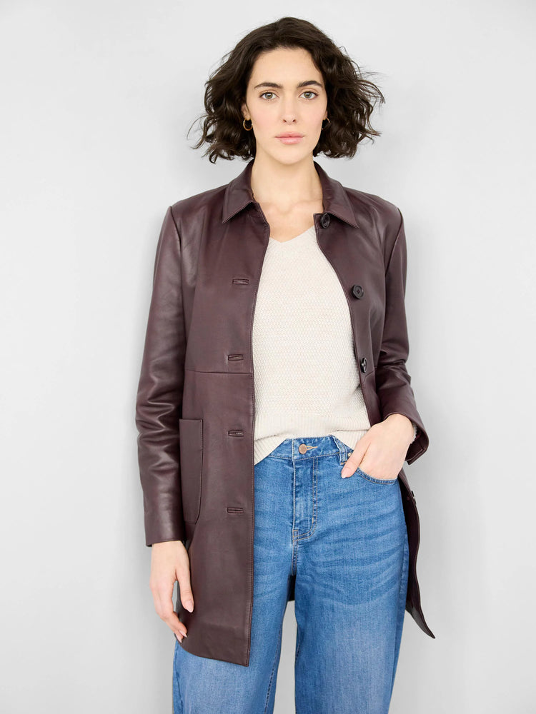 Burgundy leather car coat; button front, hip-length, long sleeves.