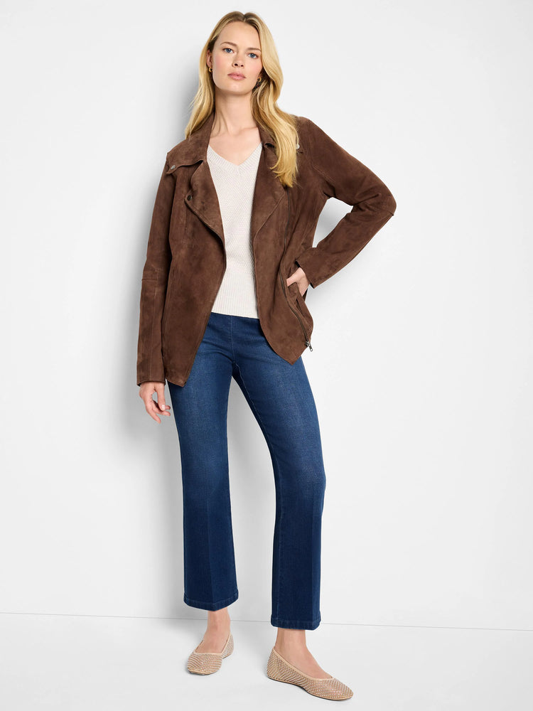 Brown suede snap jacket. Asymmetrical zipper. Model shown wearing it with dark jeans.