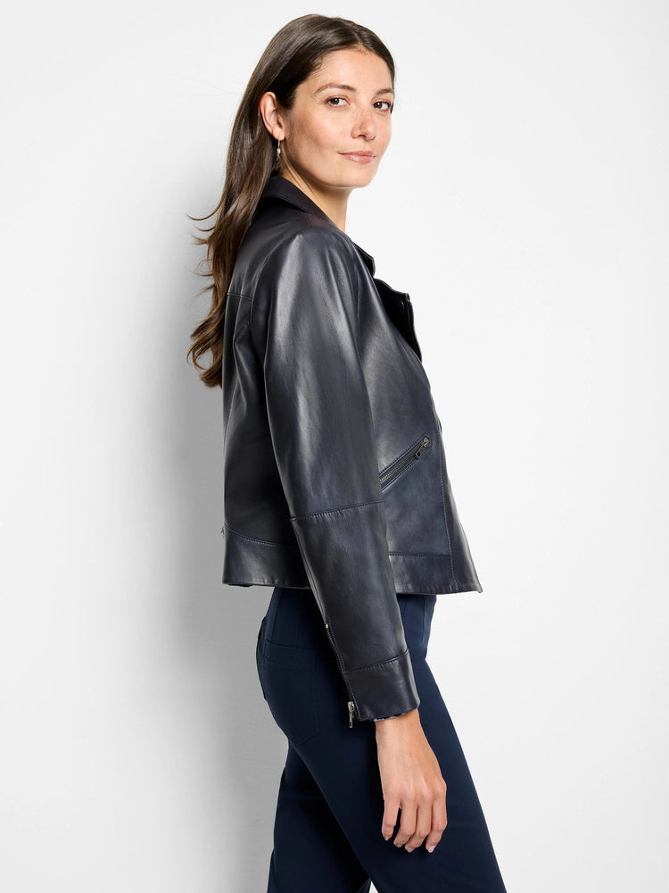 Dark navy blue leather biker jacket. Zipper closure, angled pockets. Cropped style.