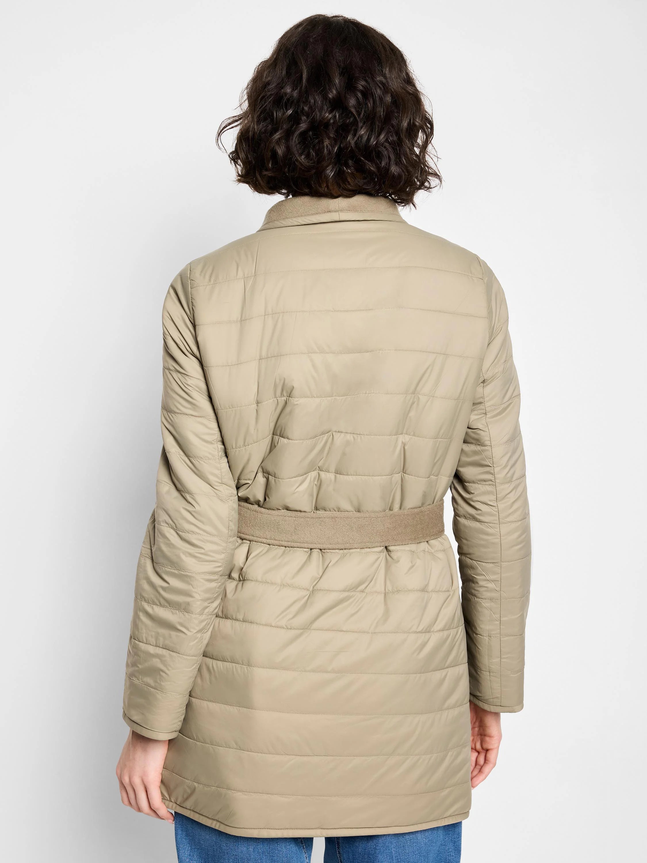 Beige quilted coat, belted, horizontal stitching.  Features a lighter beige collar and belt.