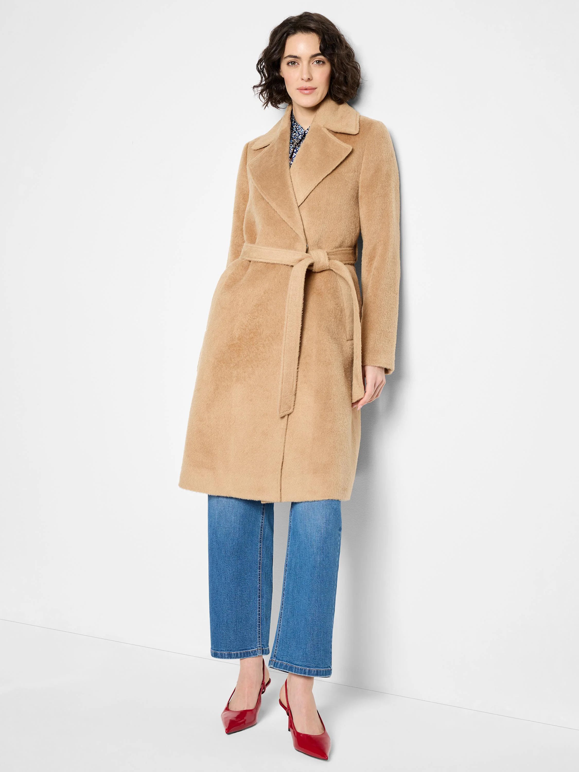 Beige, belted wrap coat.  Mid-length, collarless.