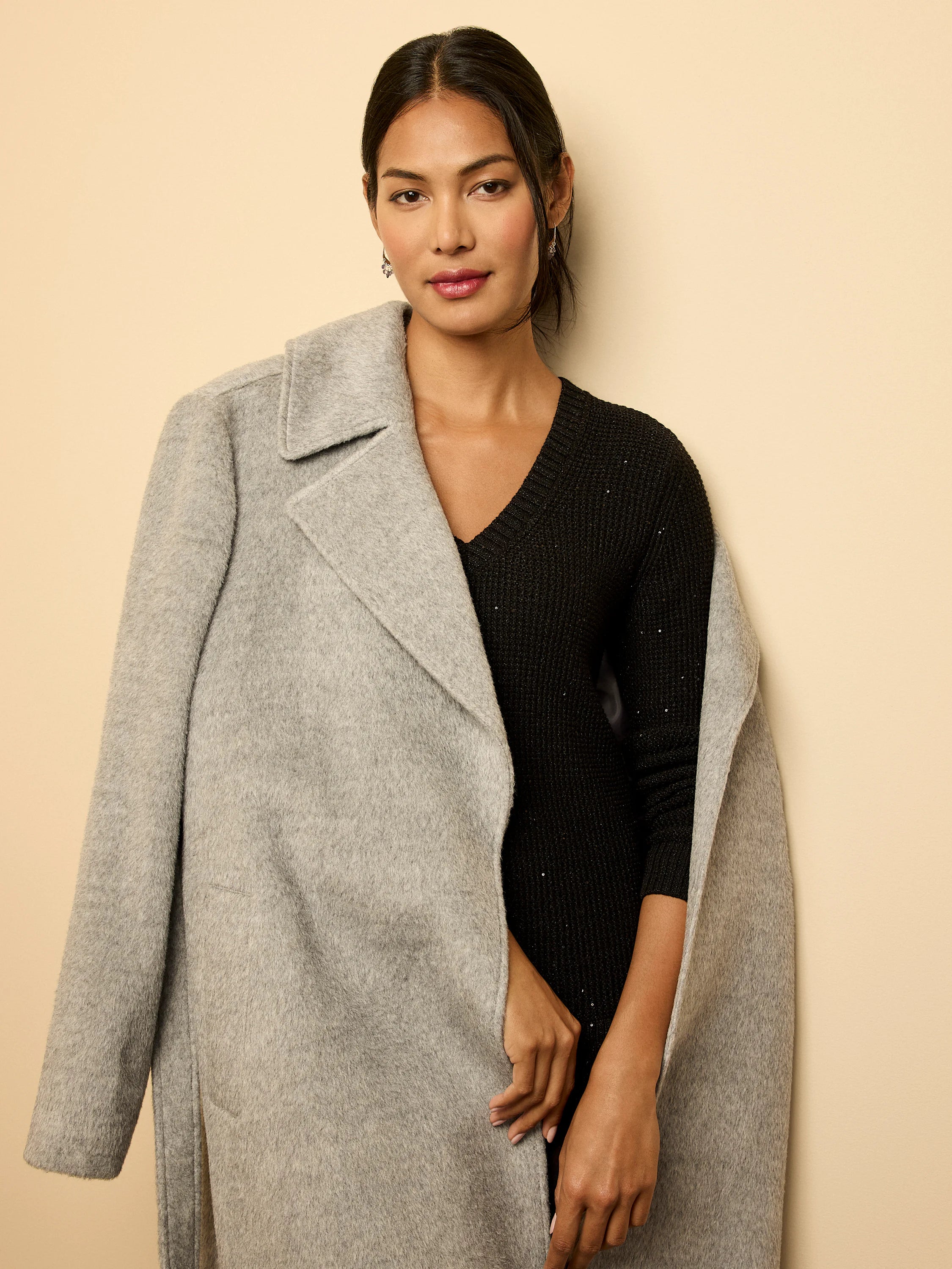 Light grey fuzzy wrap coat with wide lapels.
