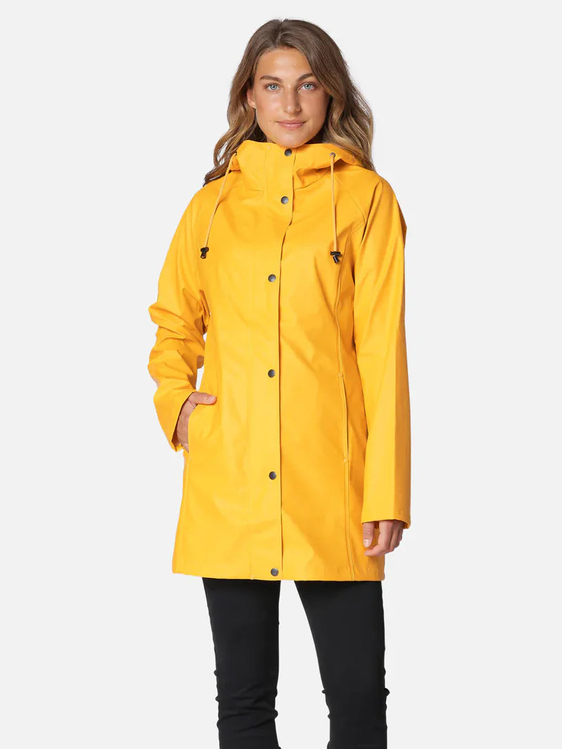 Bright yellow hooded raincoat with black snap buttons, tan drawstrings, and side pockets. Worn mid-thigh length.