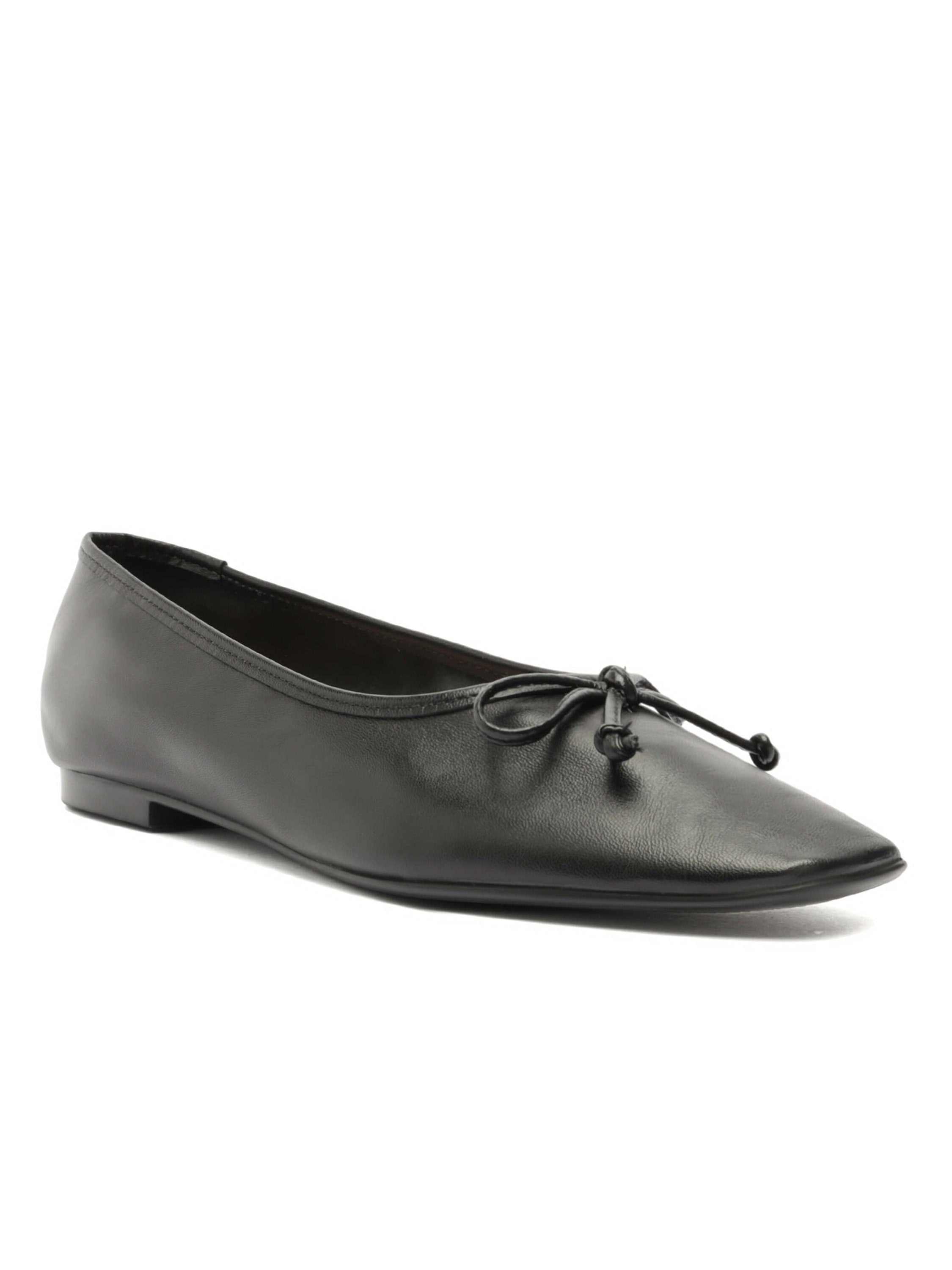 Black leather pointed-toe ballet flats feature a delicate bow detail on the vamp.