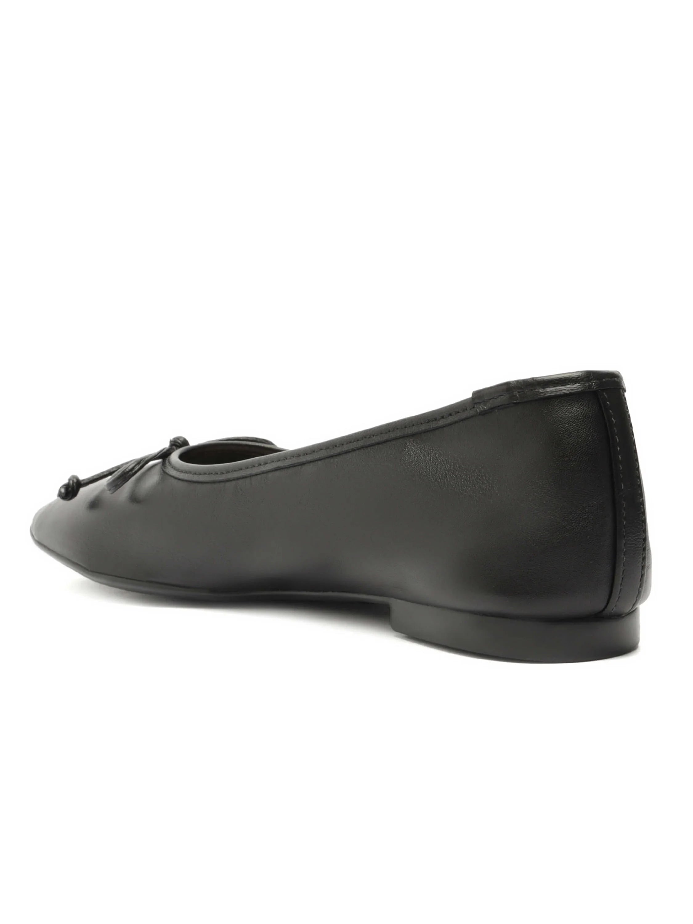 Black leather ballet flat with square toe, small knotted bow, and low block heel.