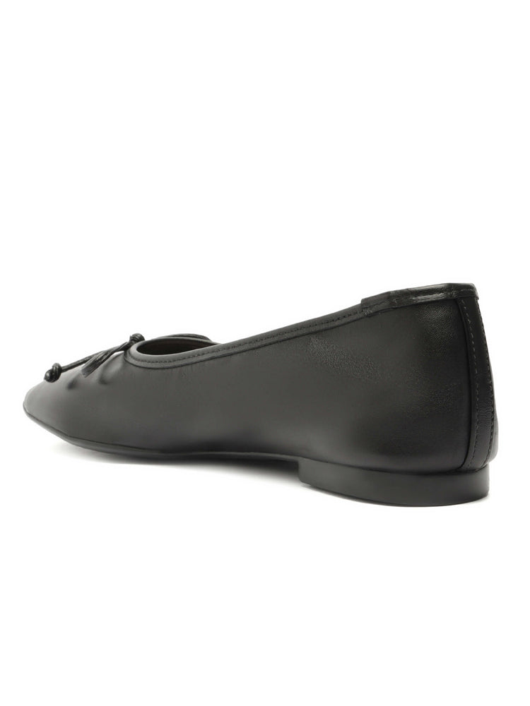 Black leather square-toe ballet flats offer a low heel and a small decorative knot detail at the vamp.