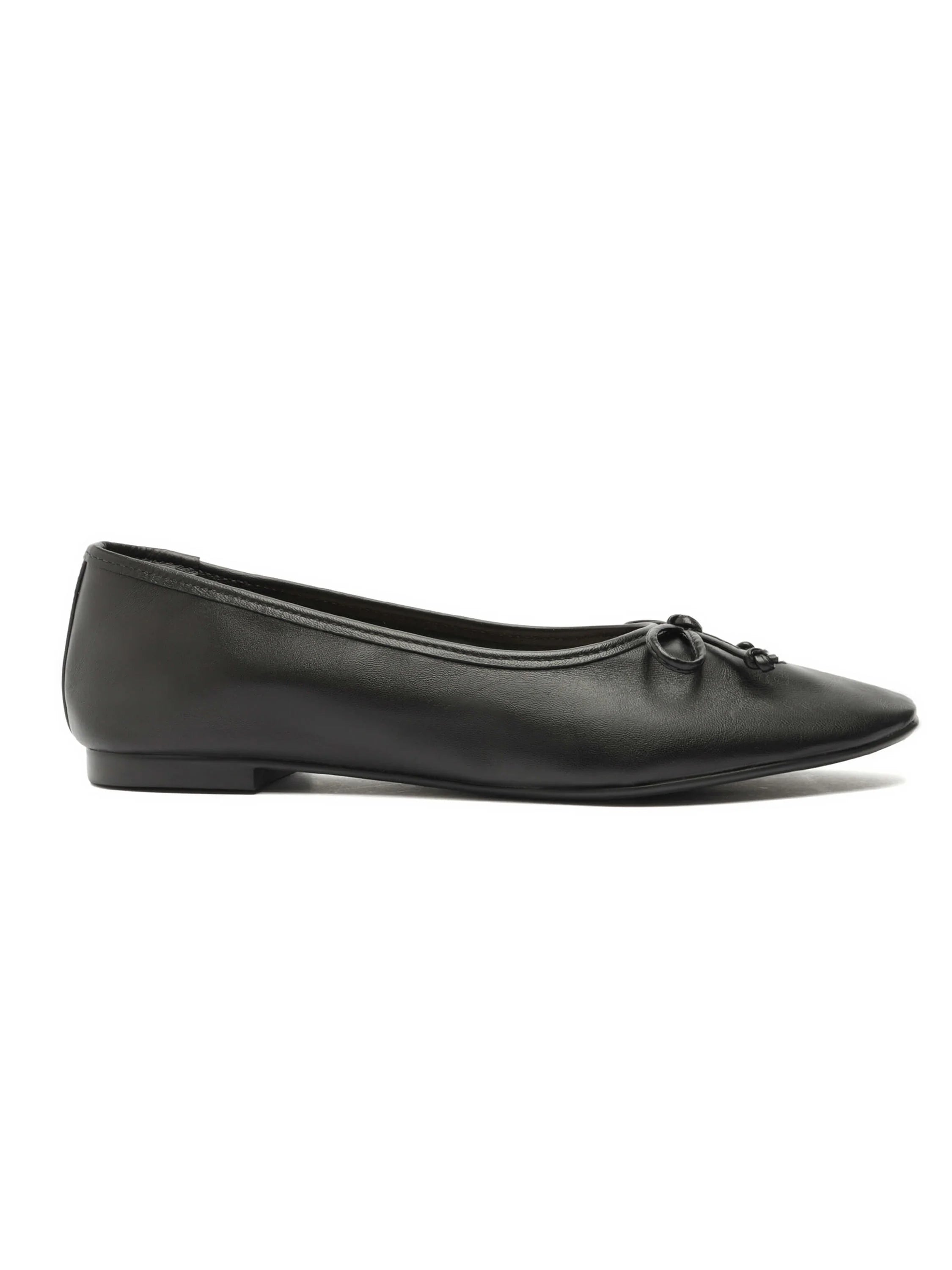 Black leather ballet flat with a pointed toe and a small bow detail.