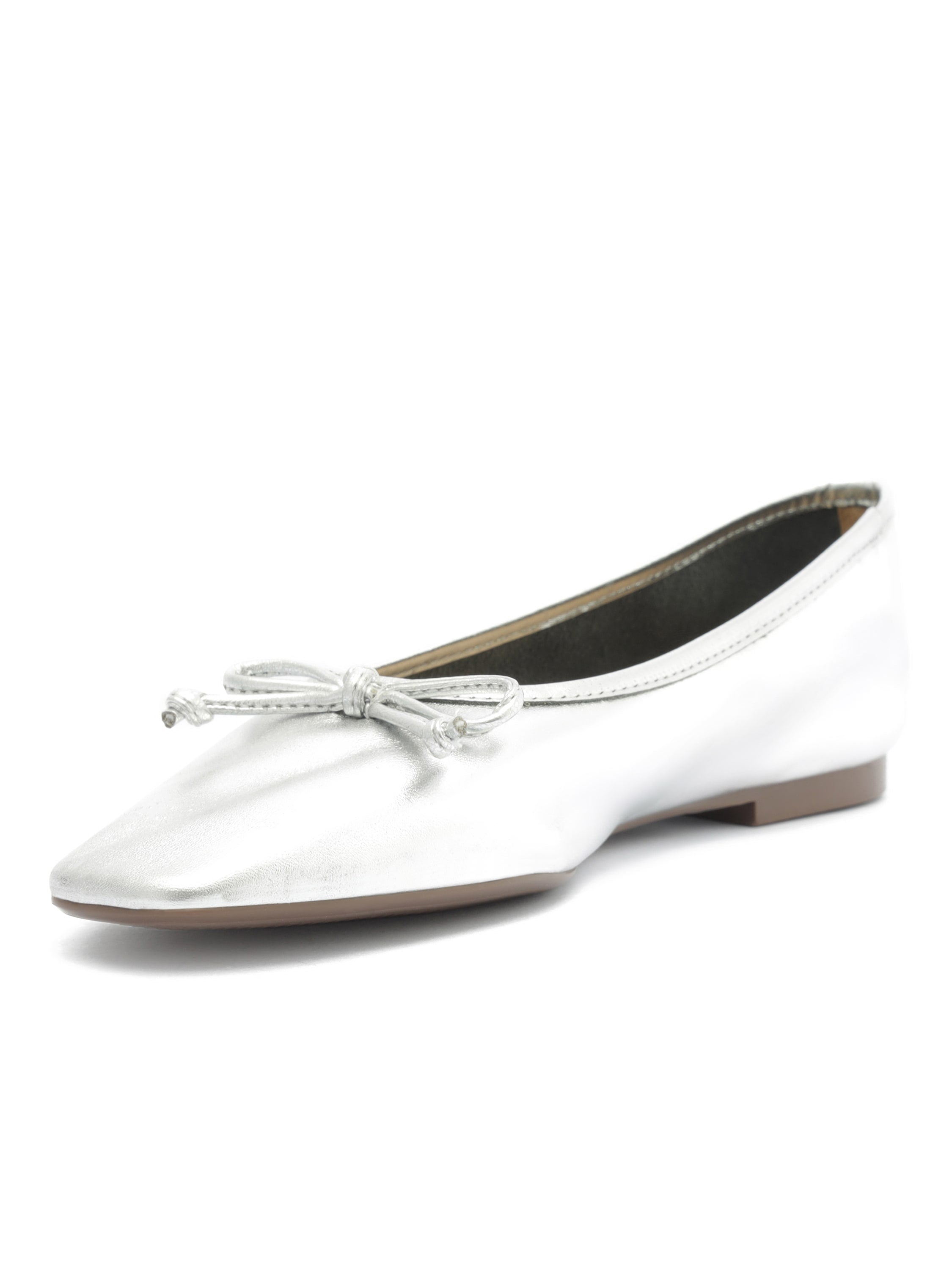 Metallic silver ballet flats feature a subtle square toe shape and a matching bow detail on the vamp.