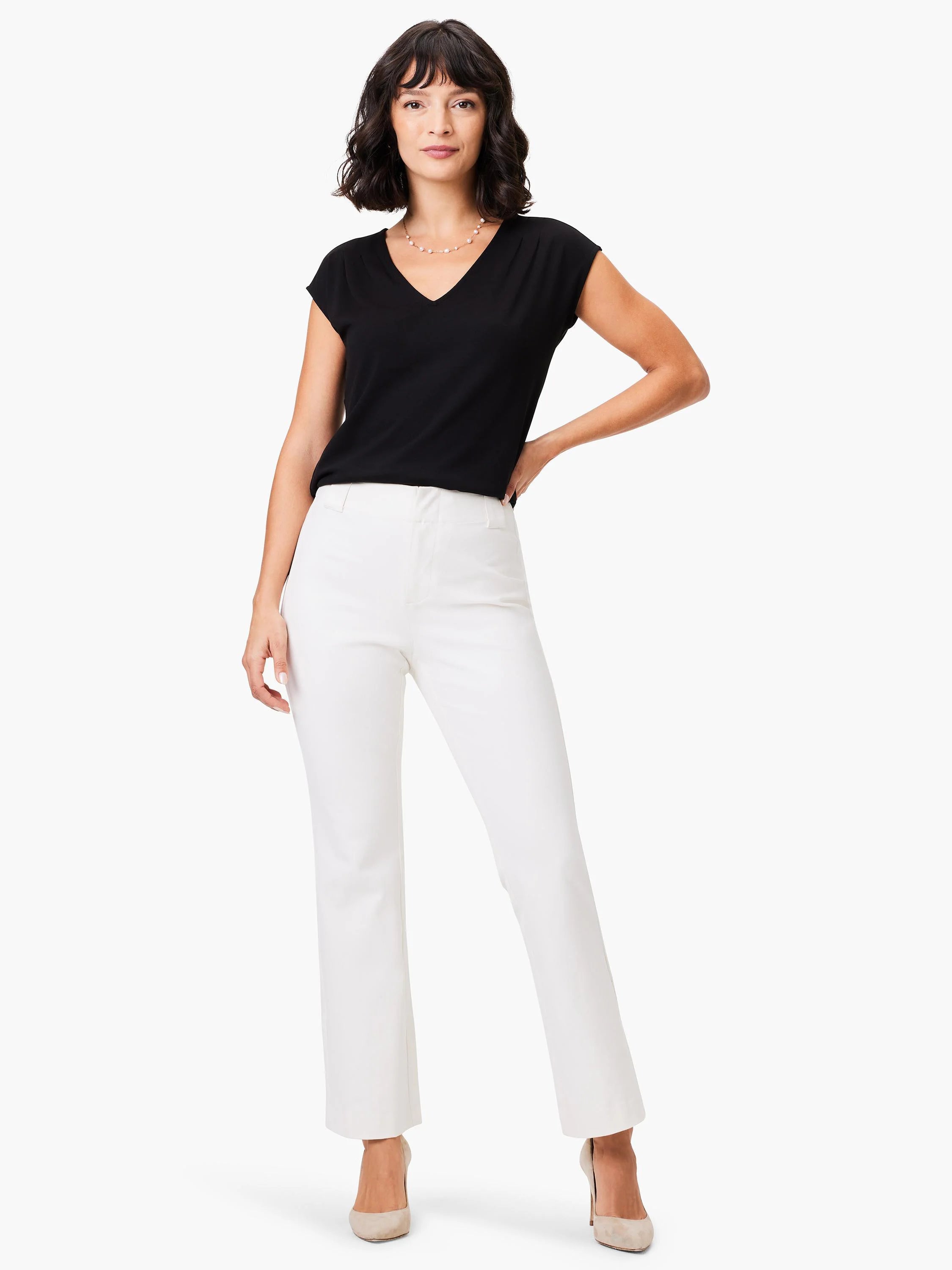 Off-white straight-leg pants; model wears black short-sleeved v-neck top and beige heels.