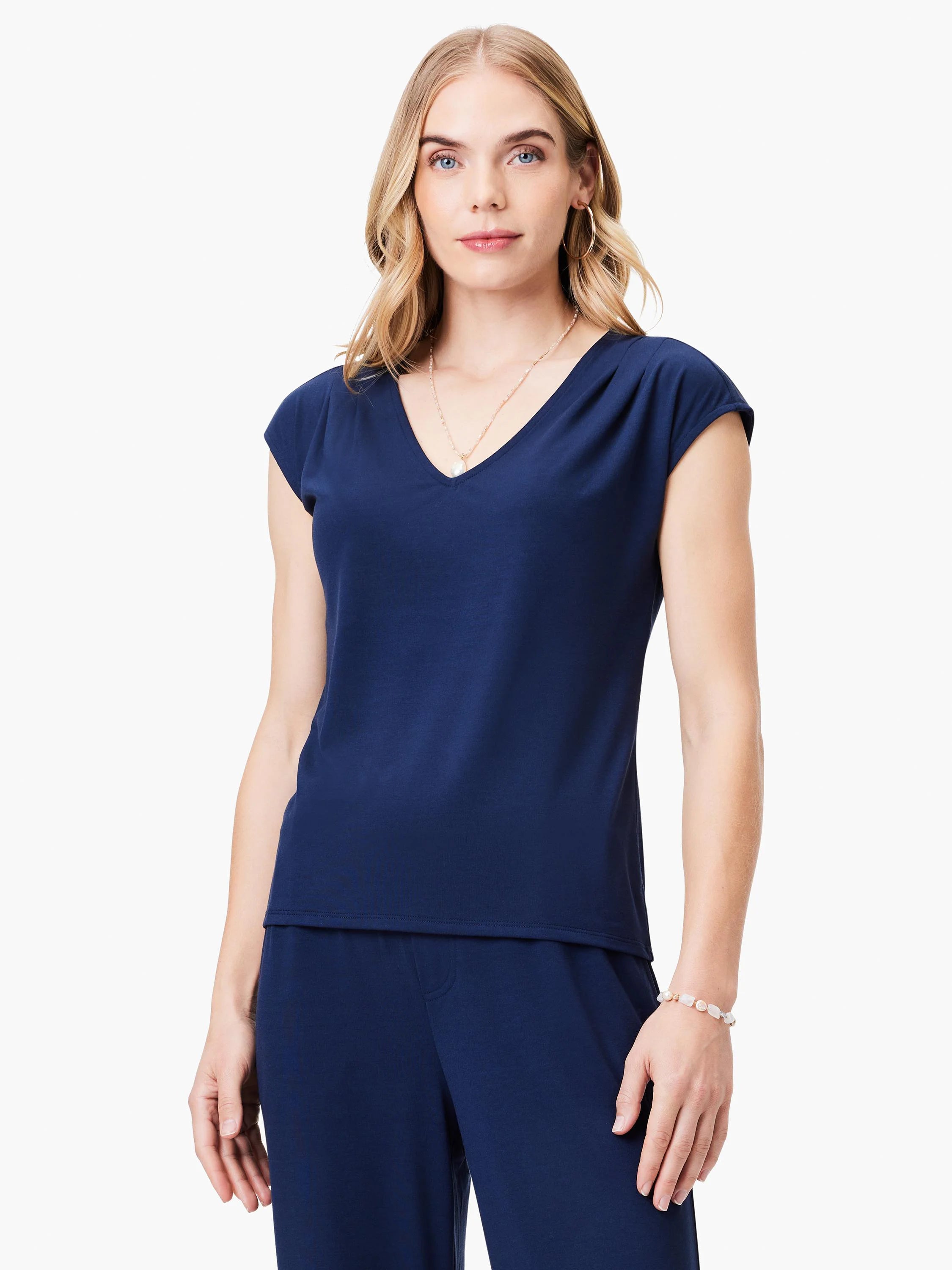 Navy blue, short-sleeved V-neck top and matching pants. Simple, fitted style.