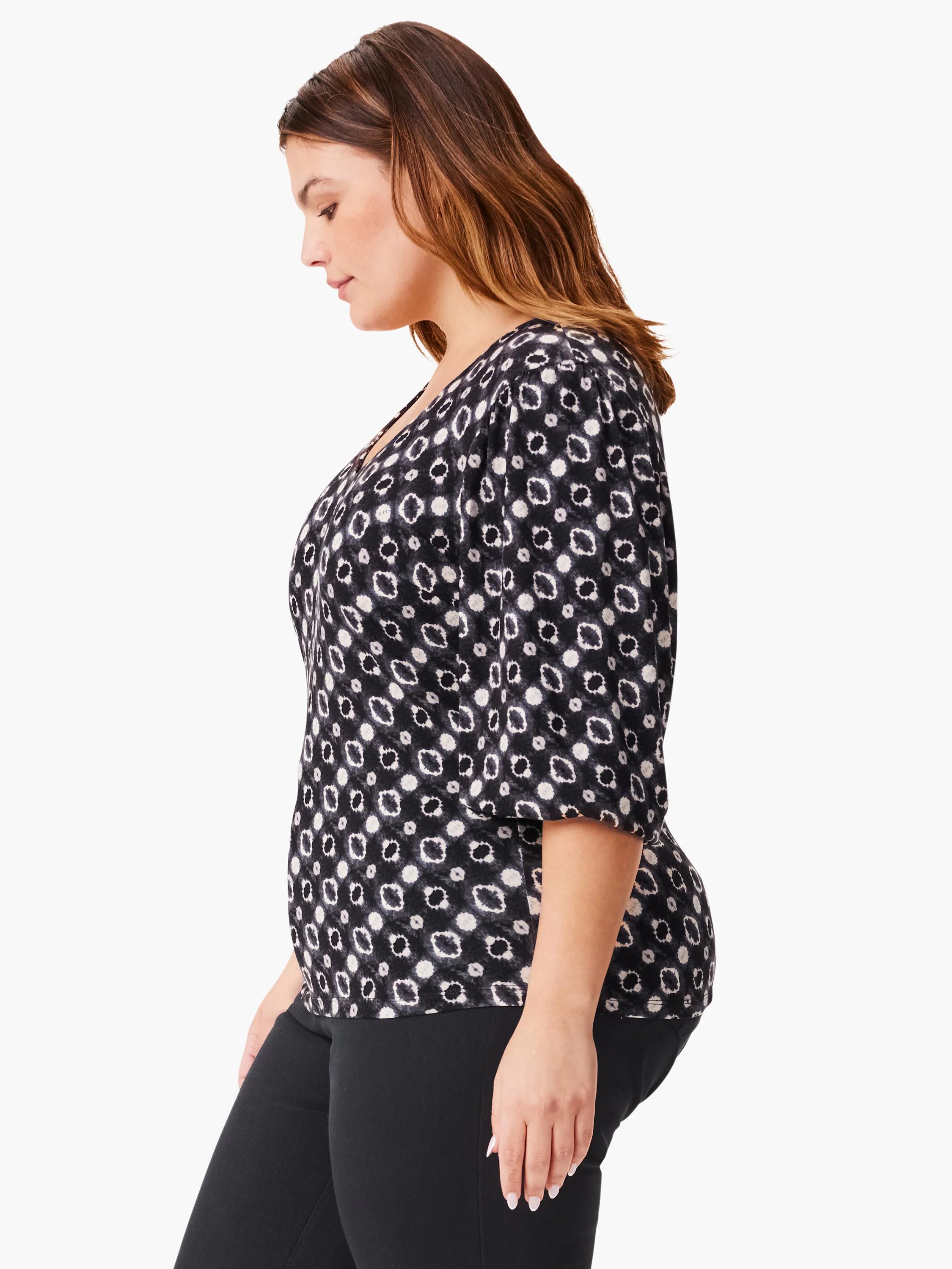 Black top with off-white and gray shibori pattern. Three-quarter sleeves, V-neck.