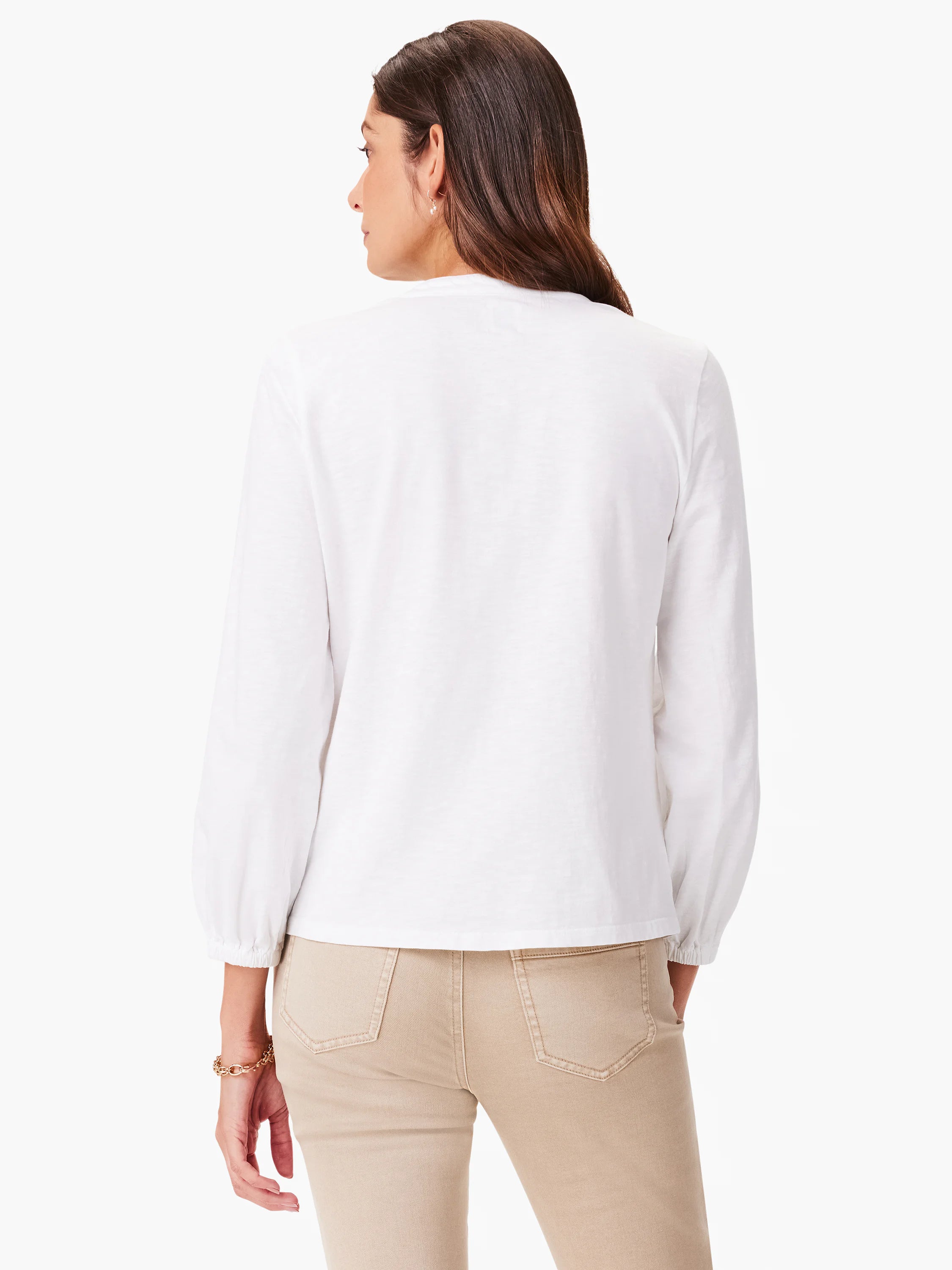 White long-sleeve top with slightly puffed sleeves. Back view.